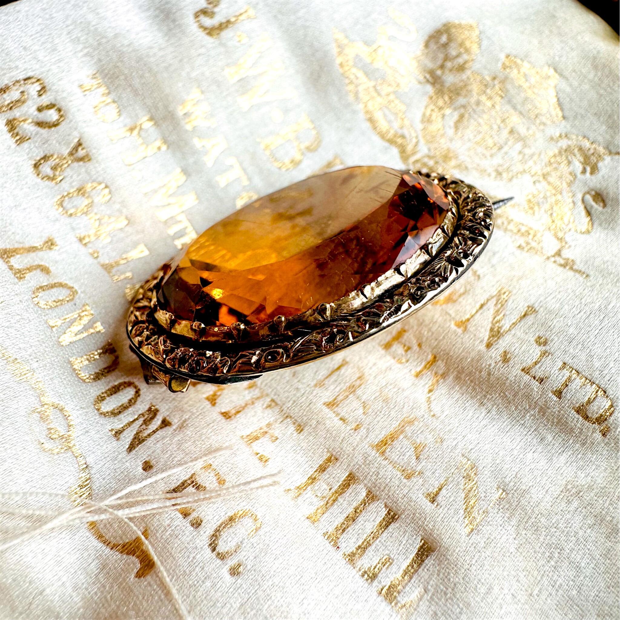 Side view of 15k Gold large Citrine Brooch, displayed in the antique box.