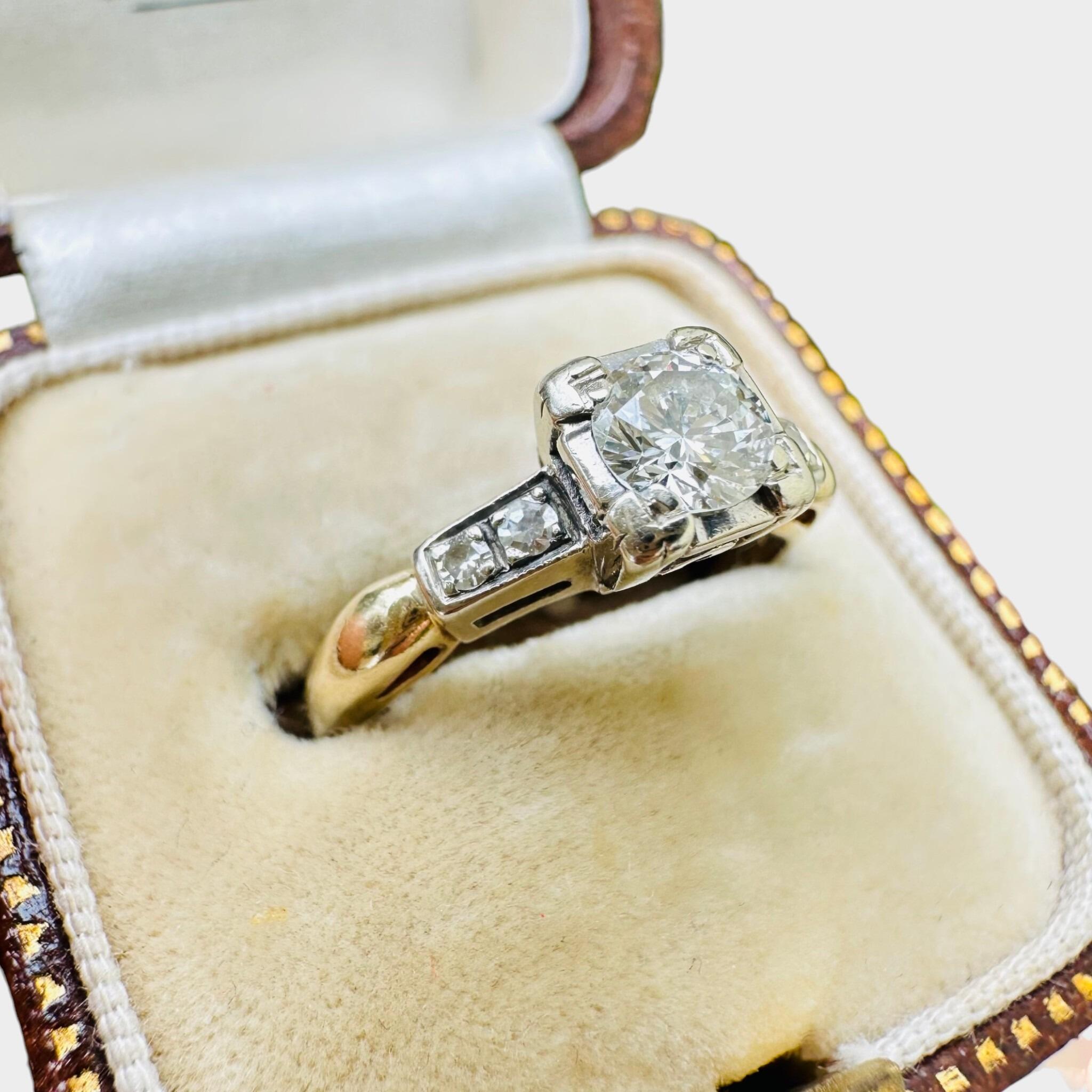 side view of 18ct Gold & Platinum Diamond Solitaire 0.55ct Ring displayed in antique box