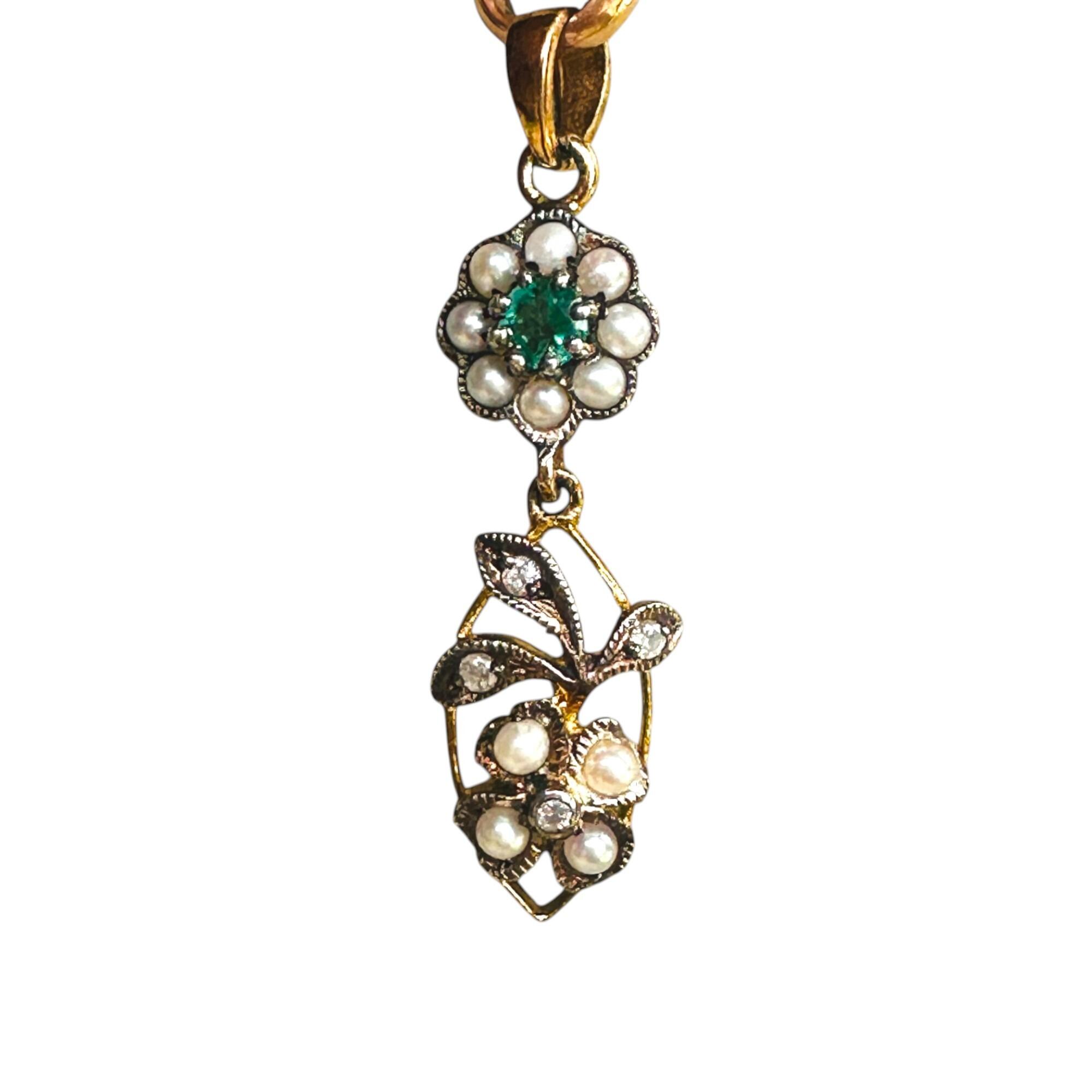 Edwardian Style Emerald, Pearl & Diamond Pendant in Silver & 9k Gold with white background.