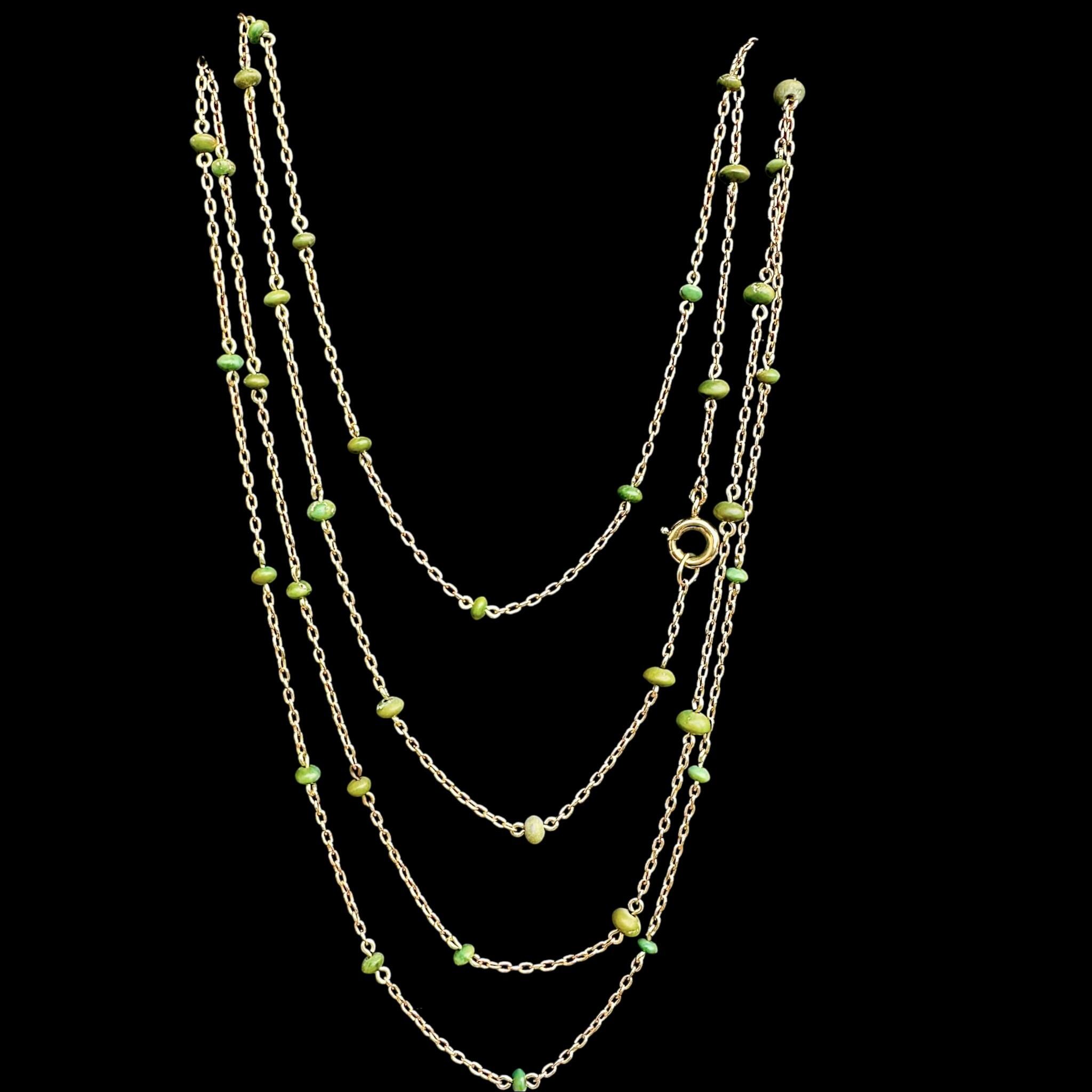 Antique Edwardian 9ct Rose Gold Turquoise Bead Guard Chain displayed on black velvet