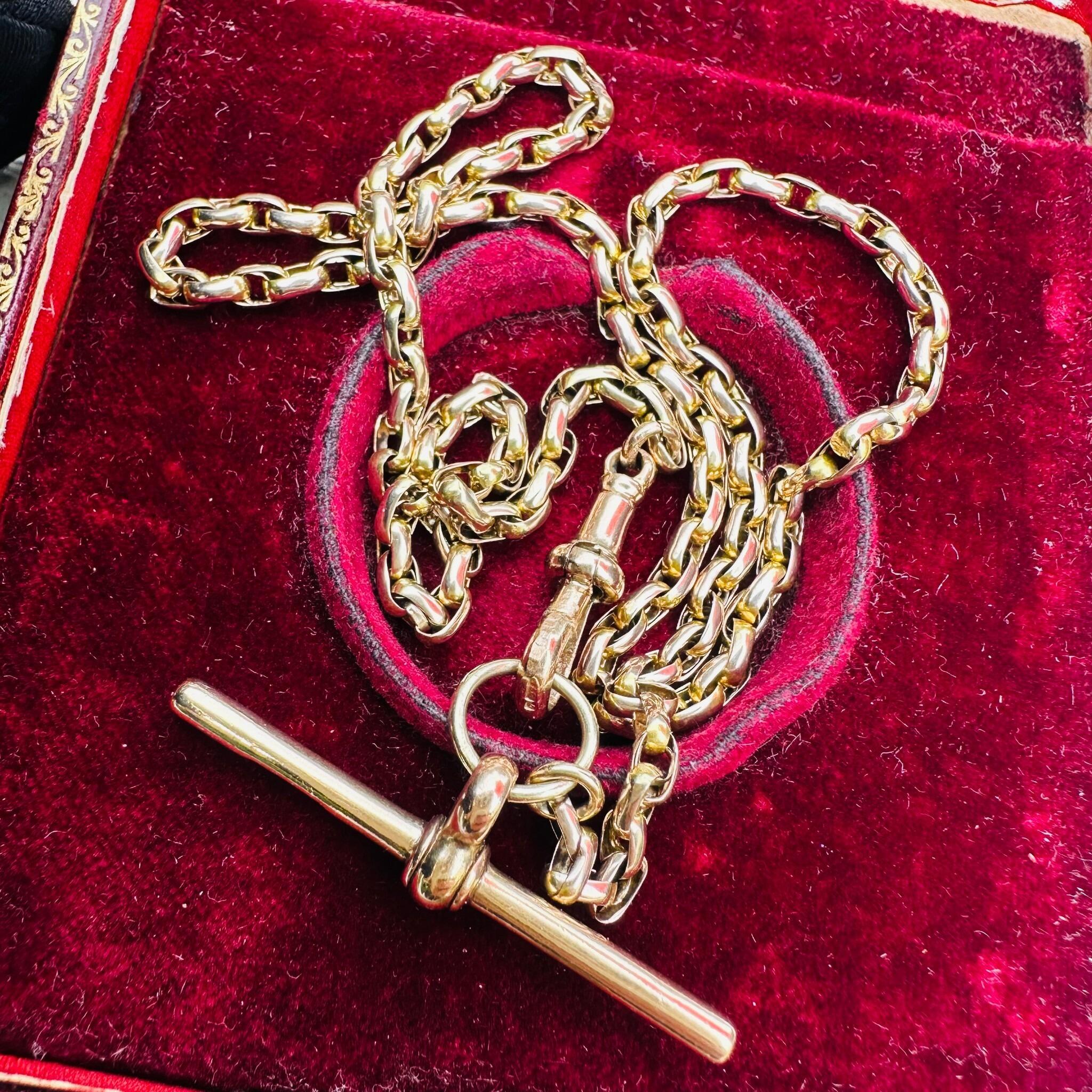 Detailed view of the hand-crafted bike links on an antique 9ct gold Victorian necklace.