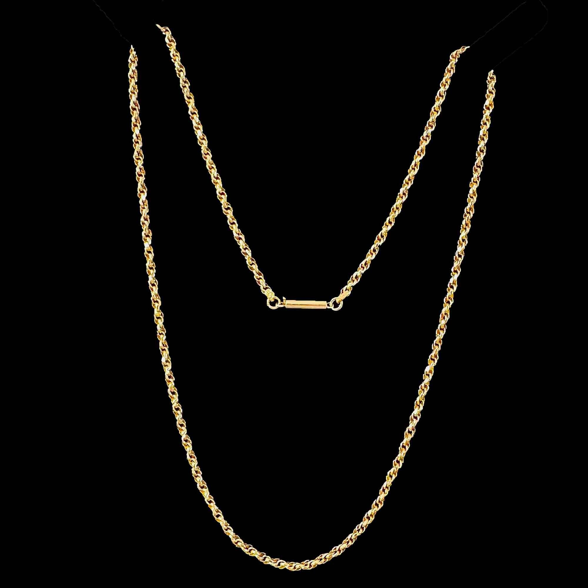 Antique 9ct gold rope chain necklace with classic barrel clasp, displayed with a black background.