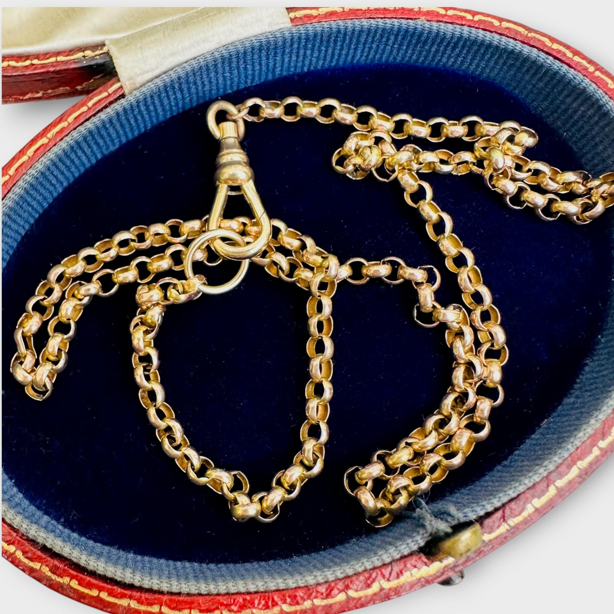 Vintage 9k gold belcher chain necklace with dog clip detail, displayed in antique box.