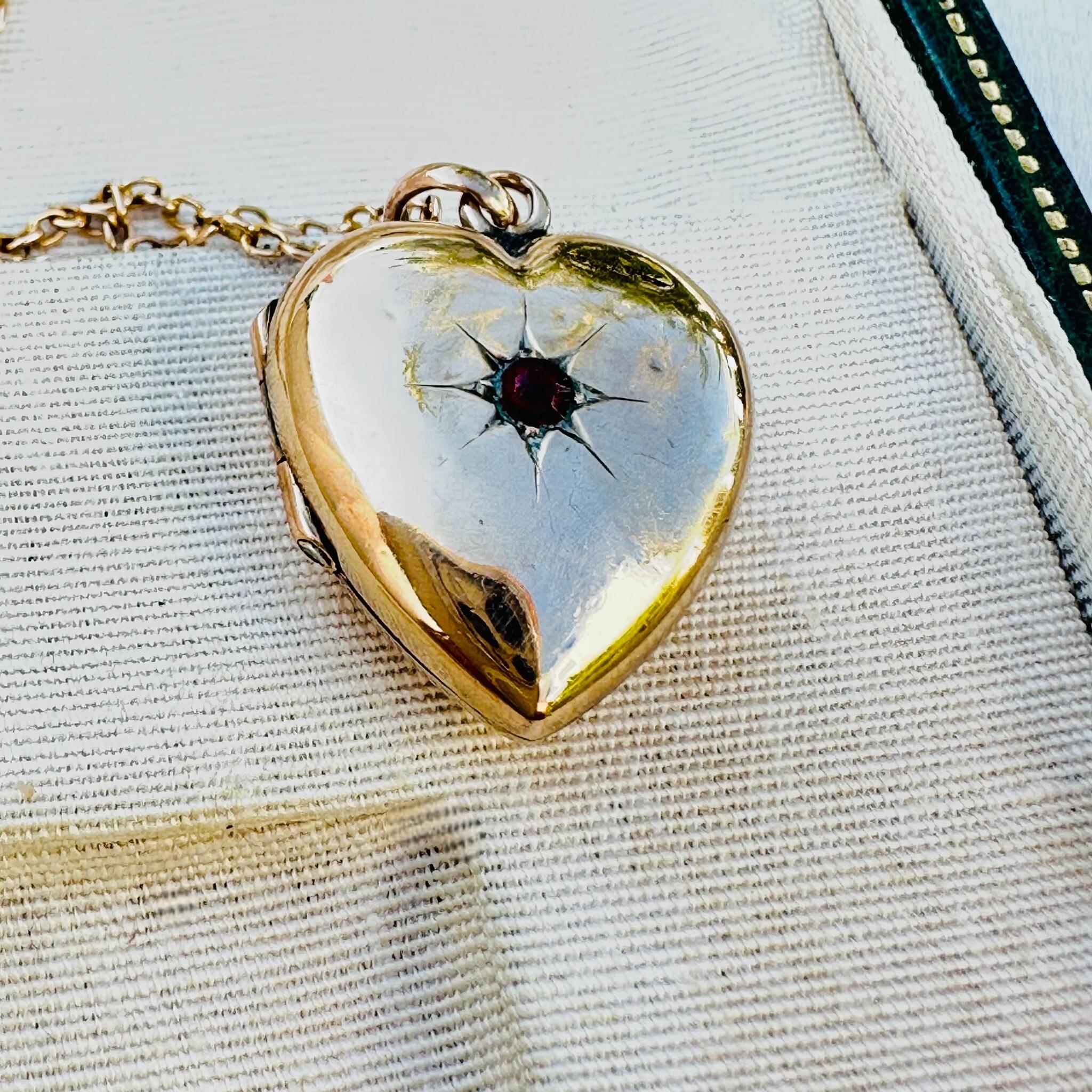 Victorian Gold Heart Locket Pendant with Garnet Star-Set Detail, side view in antique box