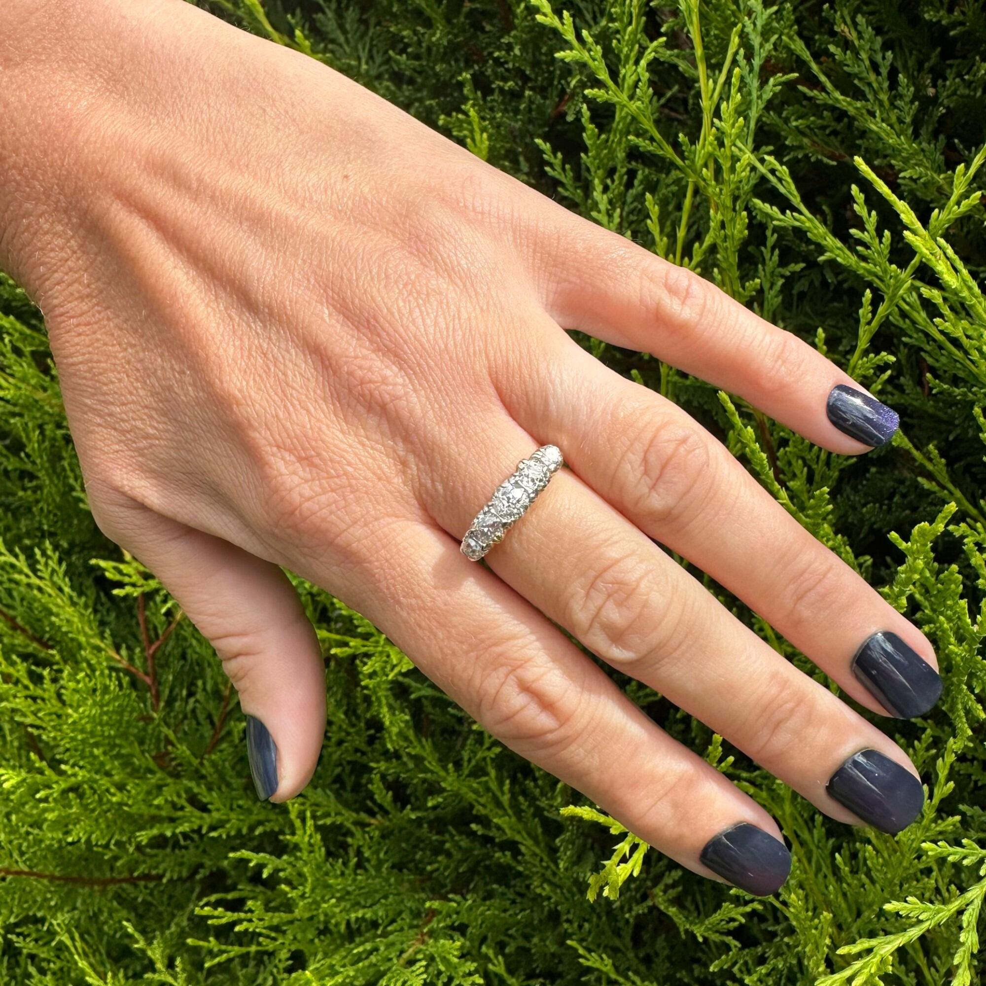 Victorian old-cut Diamond 1.86ct carved hoop ring displayed on models hand in garden