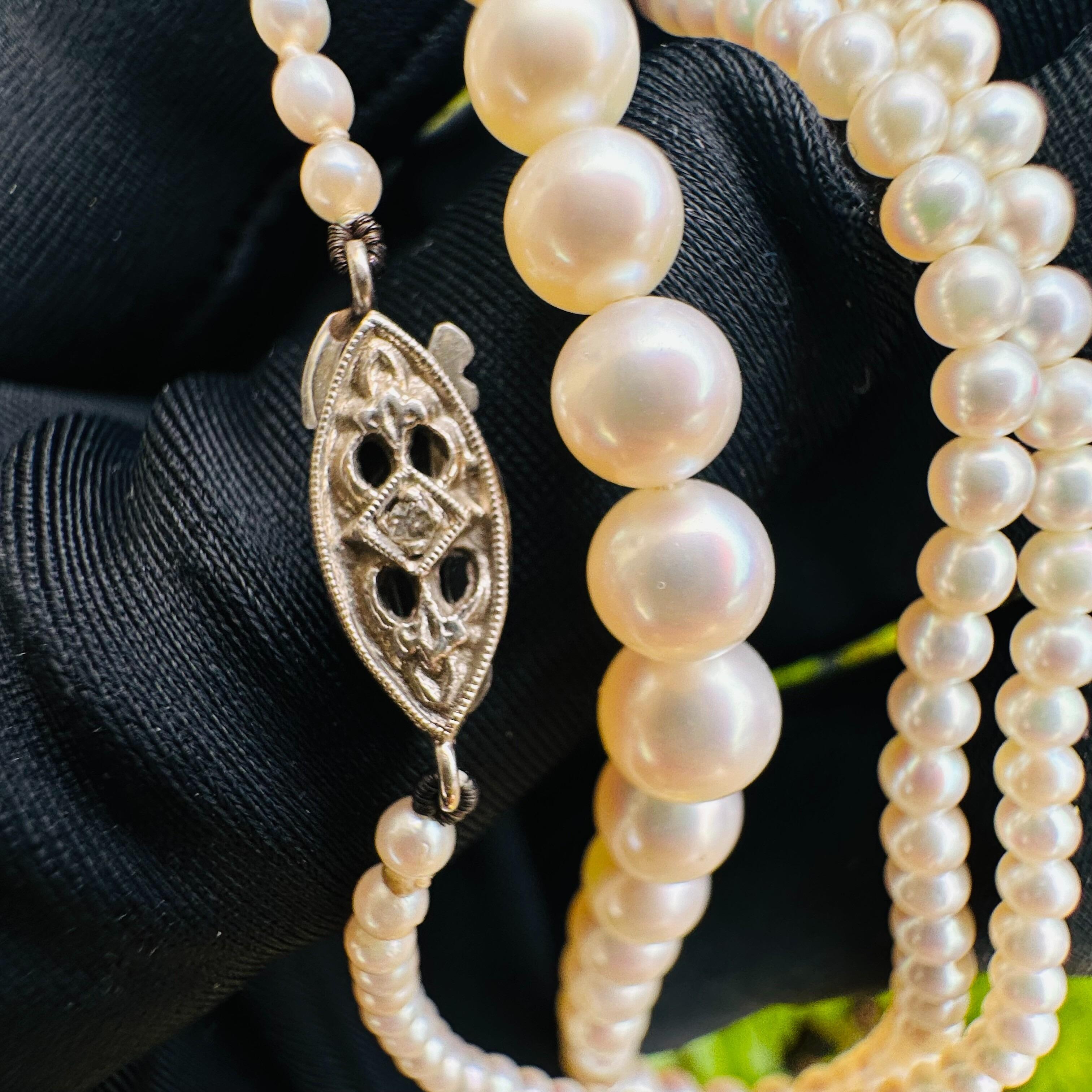 close up of White Gold & Diamond, Saltwater Cultured Pearl Necklace