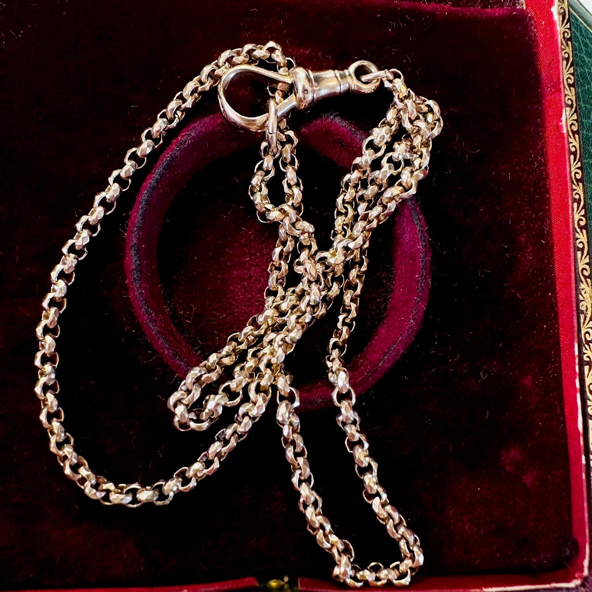 Rose Gold Belcher faceted Chain Necklace & Dog Clip displayed on antique box