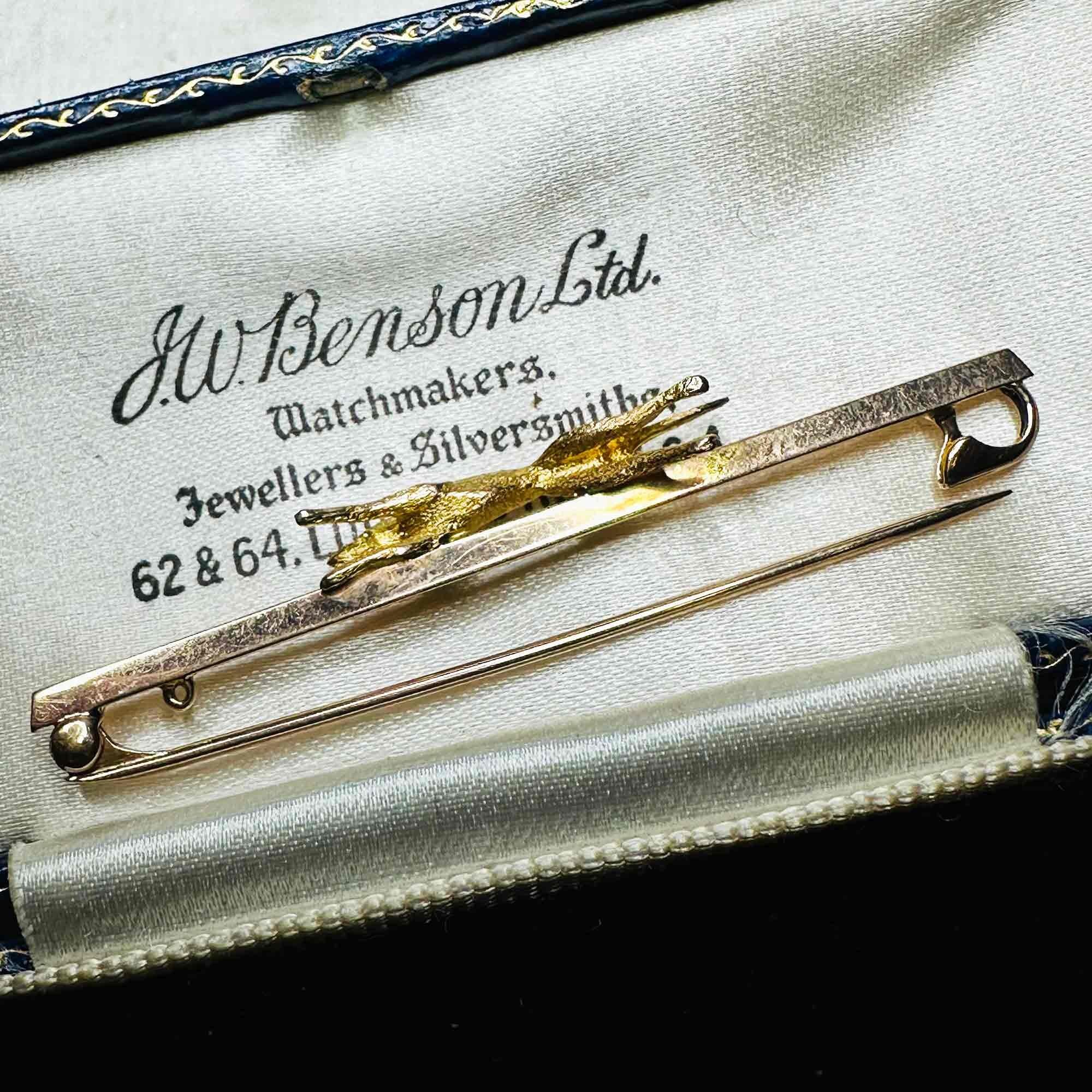 side profile of Greyhound 9k Gold Dog Pin with Ruby Eye & Original J W Benson Blue Leather Box
