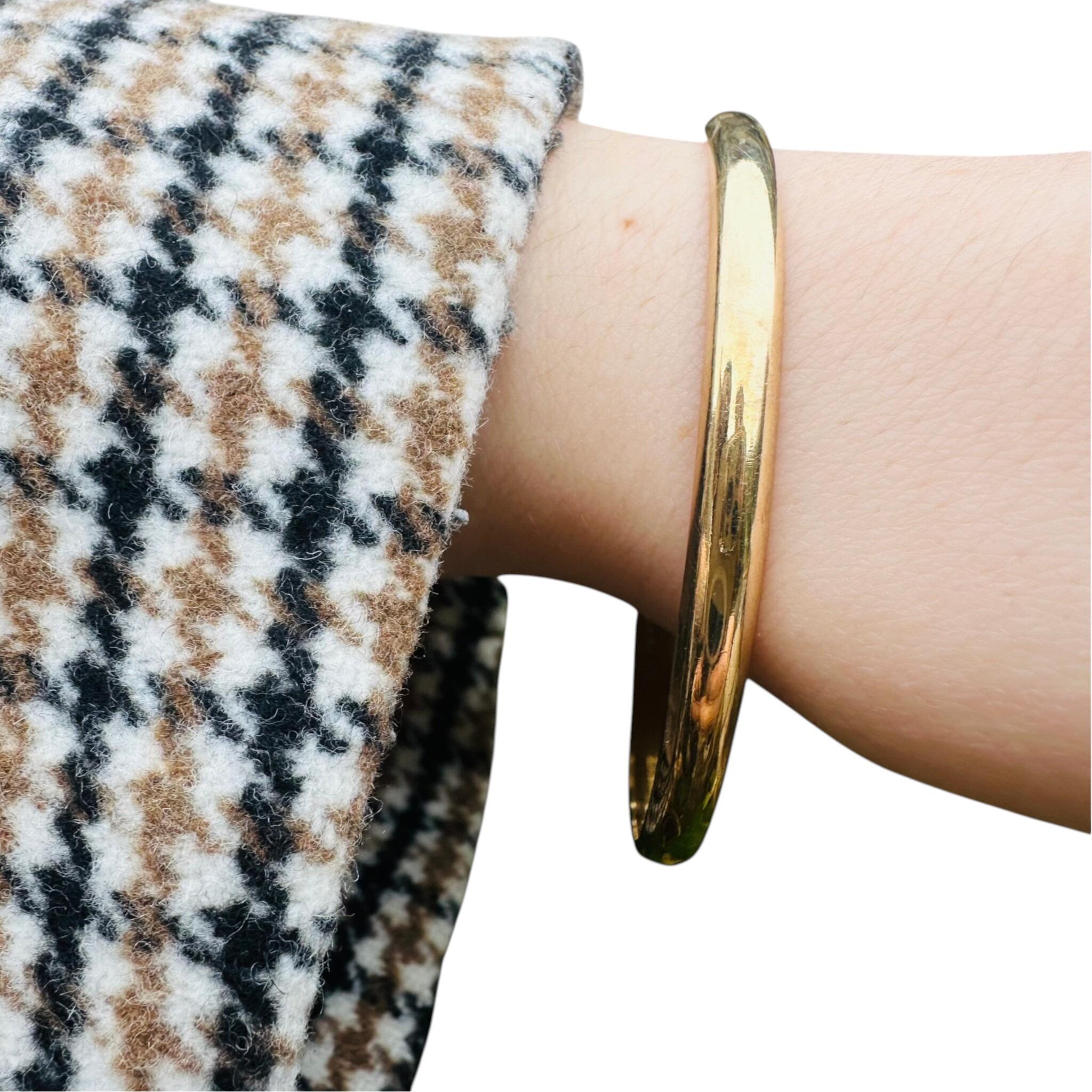 Rose Gold Double Curb Link Bracelet with Heart Padlock worn on models wrist