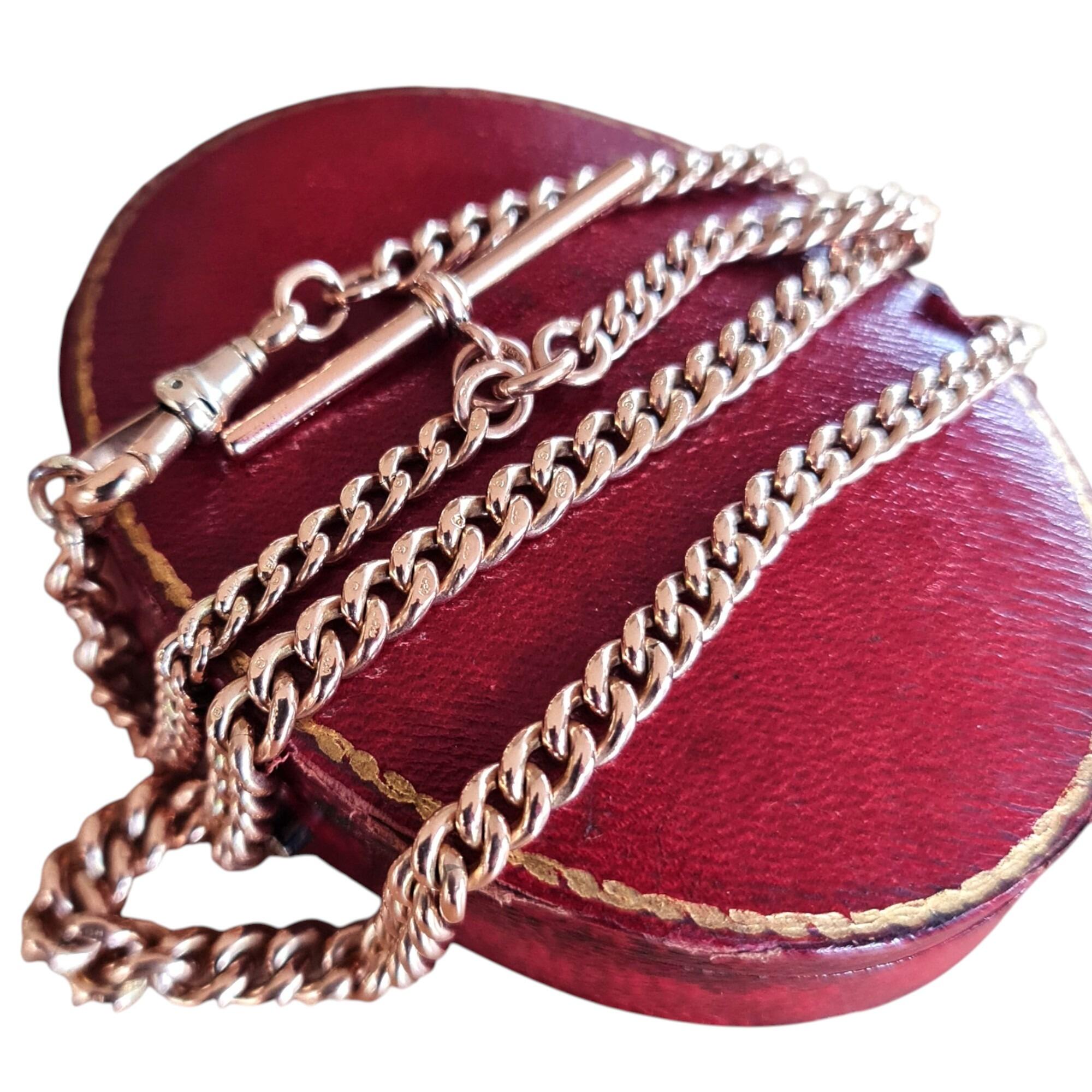9k rose gold albert watch chain with hallmarks and dog clip on red box