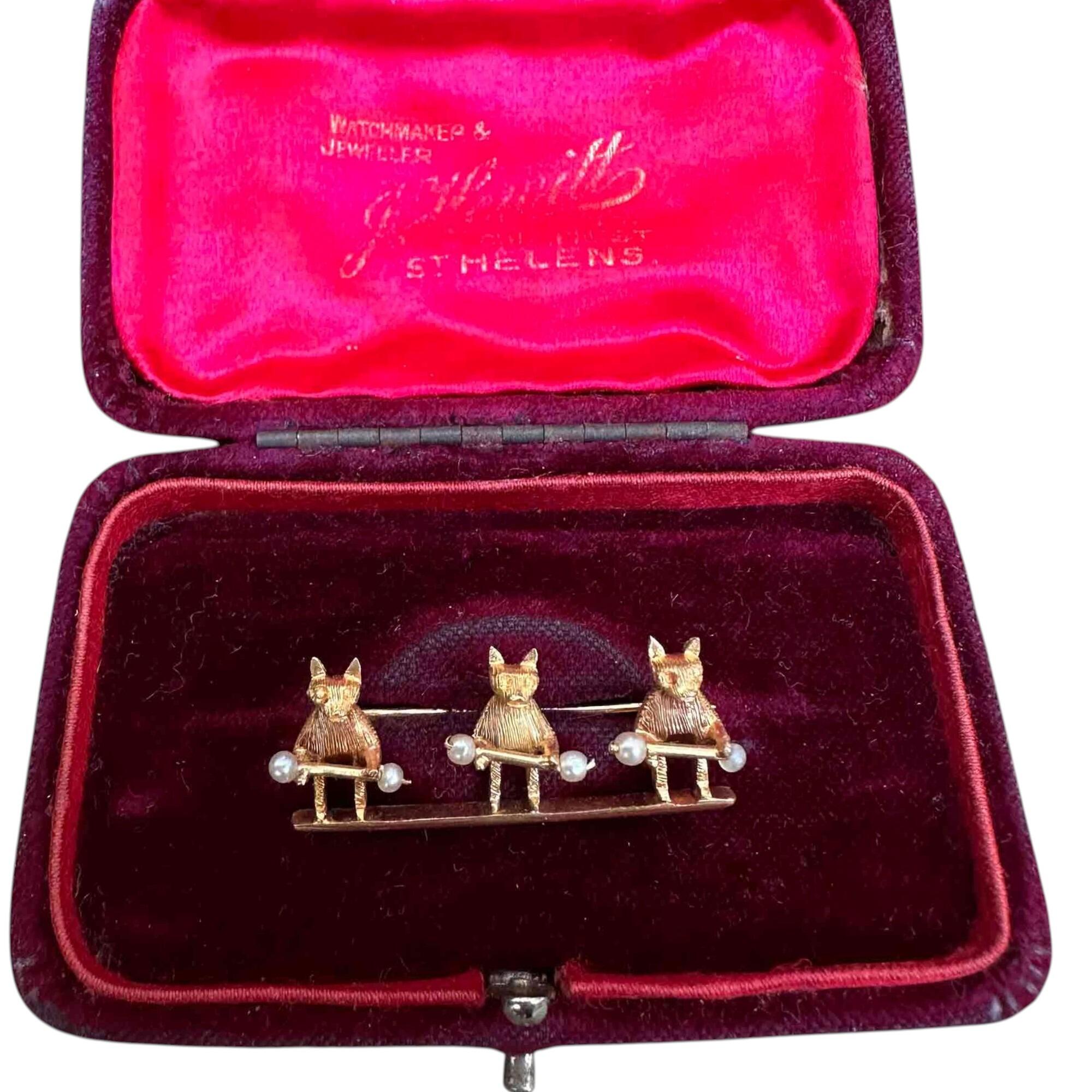 Edwardian 15ct yellow gold bar brooch with three bears each holding a pearl studded stick