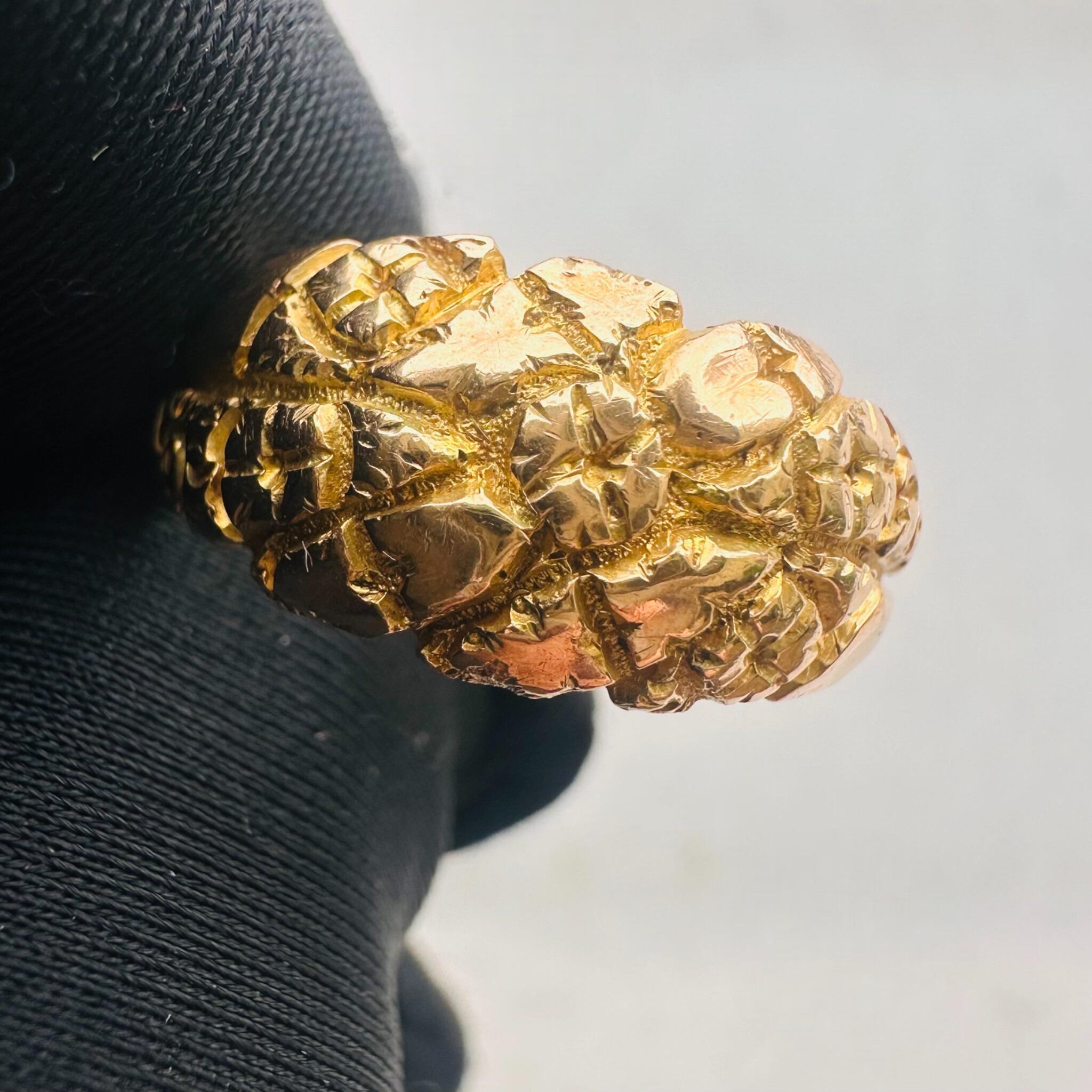 Antique Art Nouveau Gold English Repoussé Ivy & Rose Dress Ring held in blacked glove with grey background