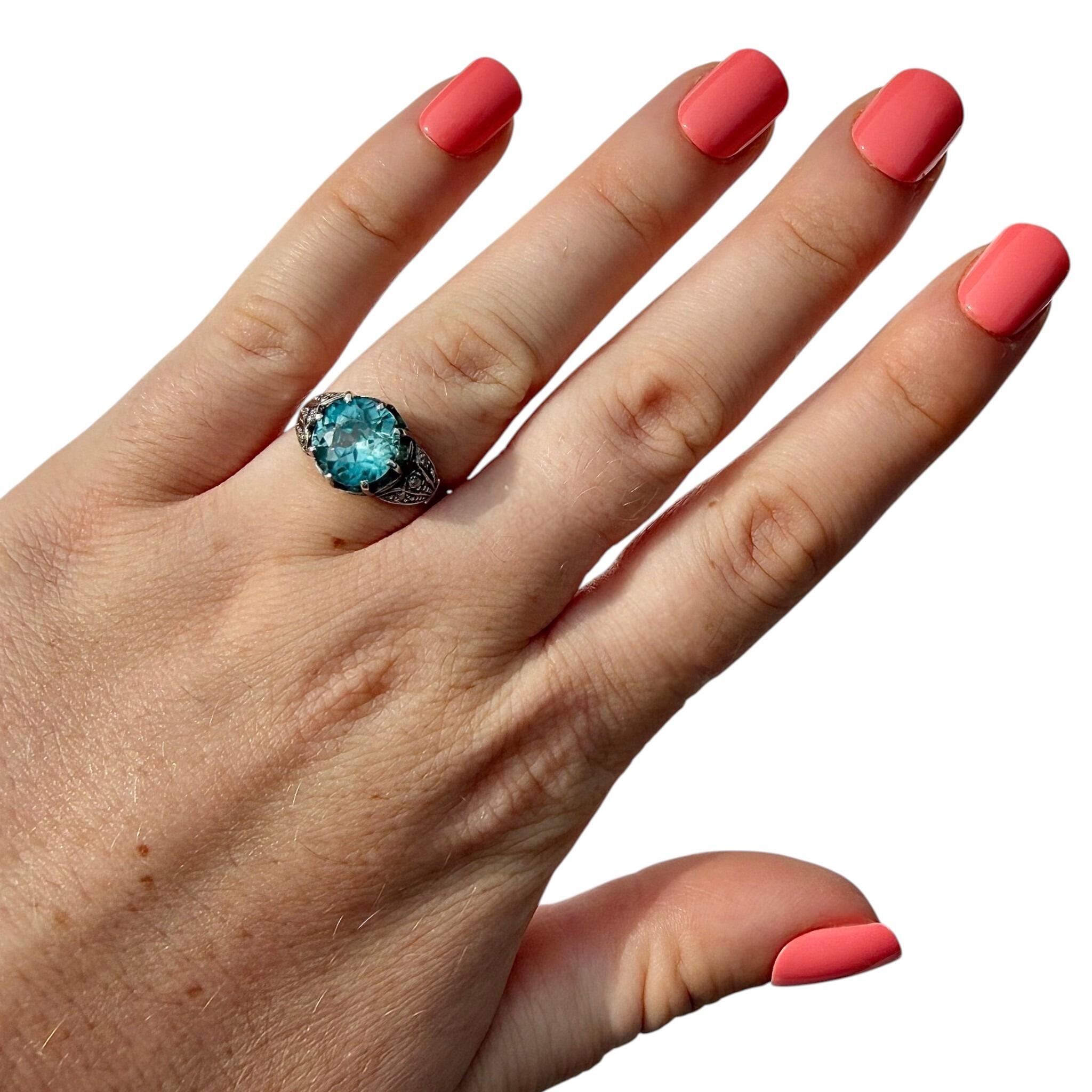 Exquisite Art Deco blue Zircon & Diamond ring with 2.75ct vivid aquamarine Zircon & diamond shoulders. Size N (US 6.75), 18ct gold, from 1920-1935.