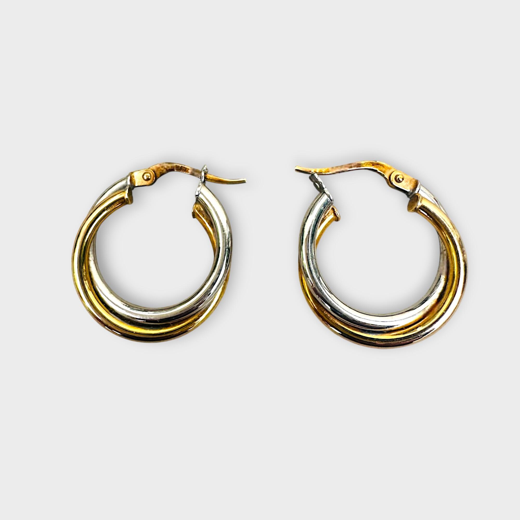 Italian bi-colour 9k gold hoop earrings on grey background.