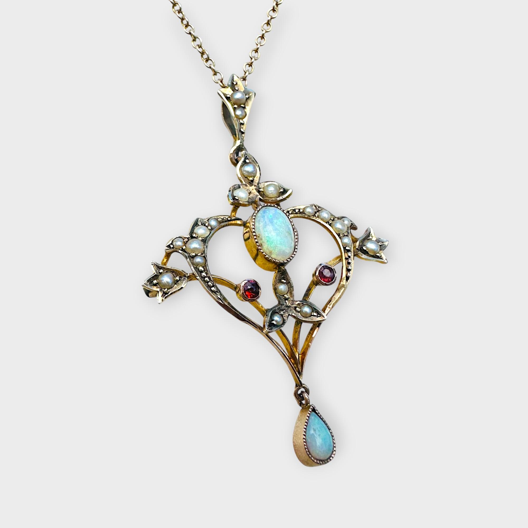 Art Nouveau 9k gold pendant brooch with opals, rubies, and pearls