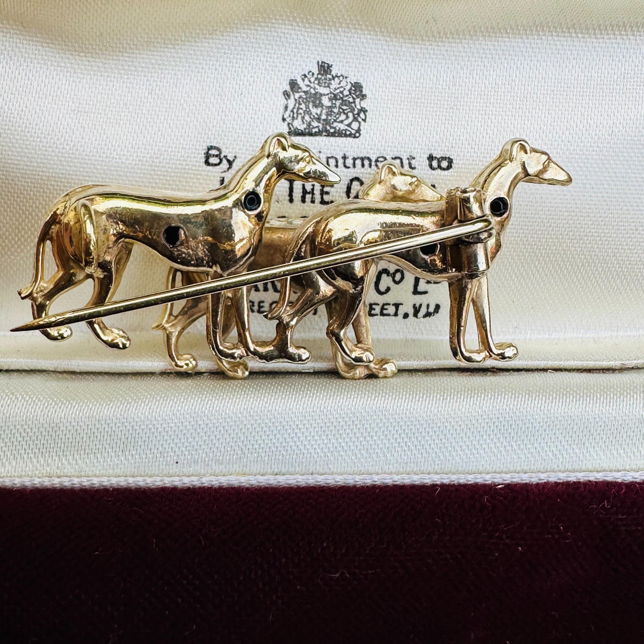 Rare, Antique 15k Gold Triple Greyhound Brooch with Diamond Eyes , displayed in antique box.