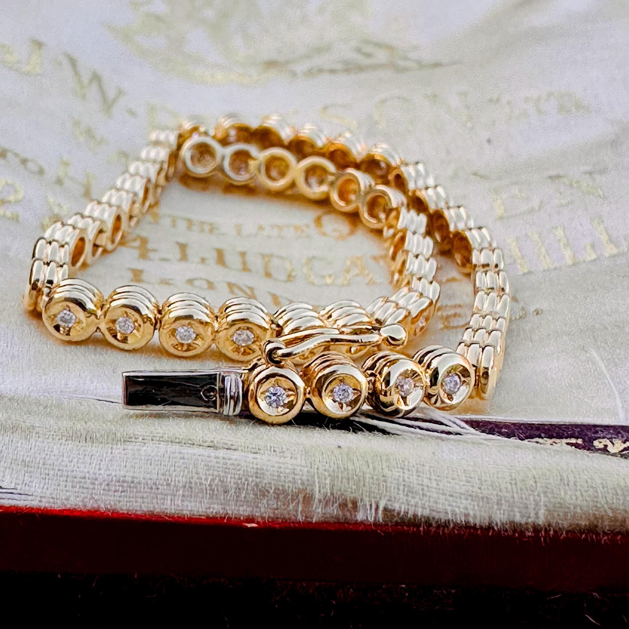 18ct Gold Diamond Line Tennis Bracelet displayed on antique box.