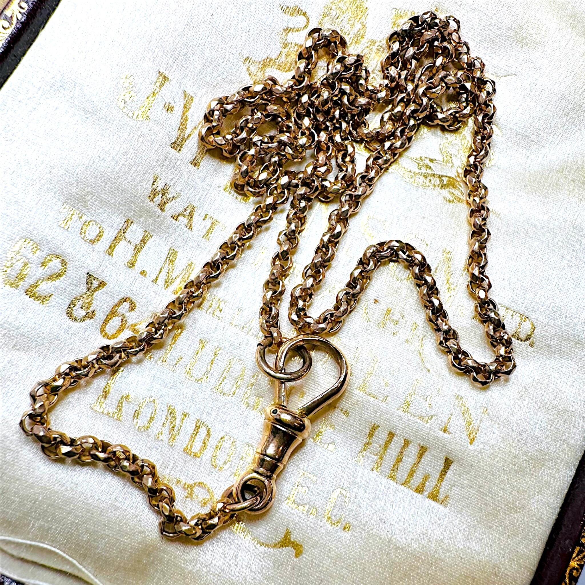 Rose Gold Belcher faceted Chain Necklace & Dog Clip displayed on antique box