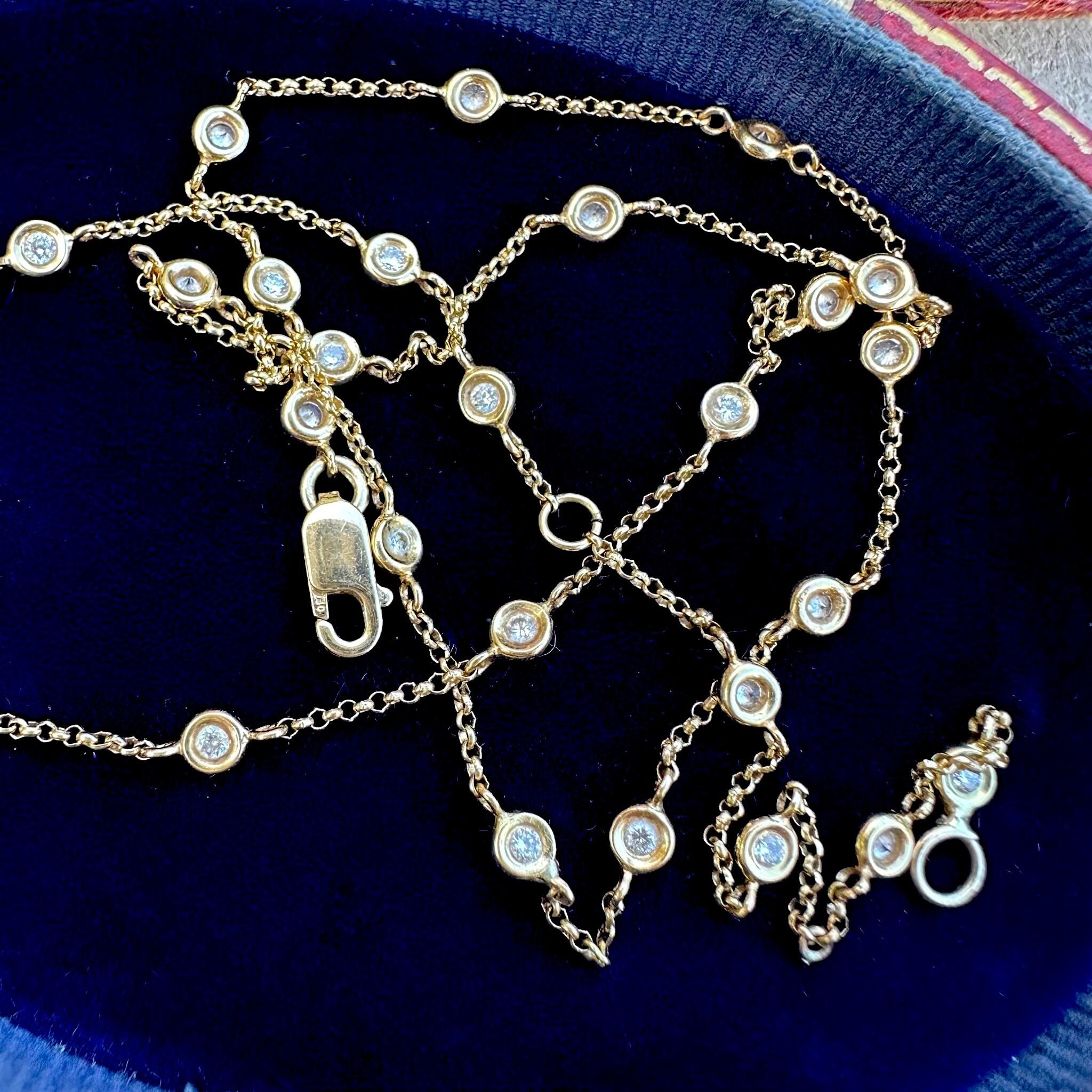 18K Gold Diamonds by the Yard Necklace Inspired by Tiffanys displayed on antique box