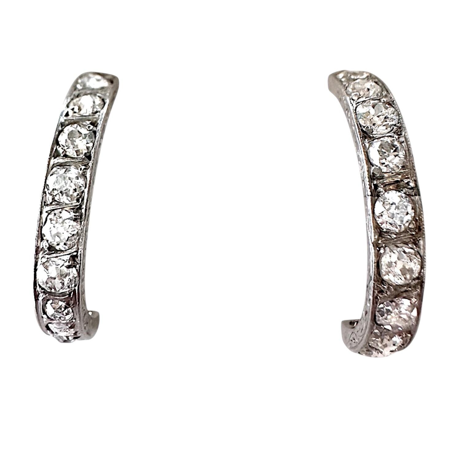 close up of Diamond & Platinum Hoop Earrings with white background