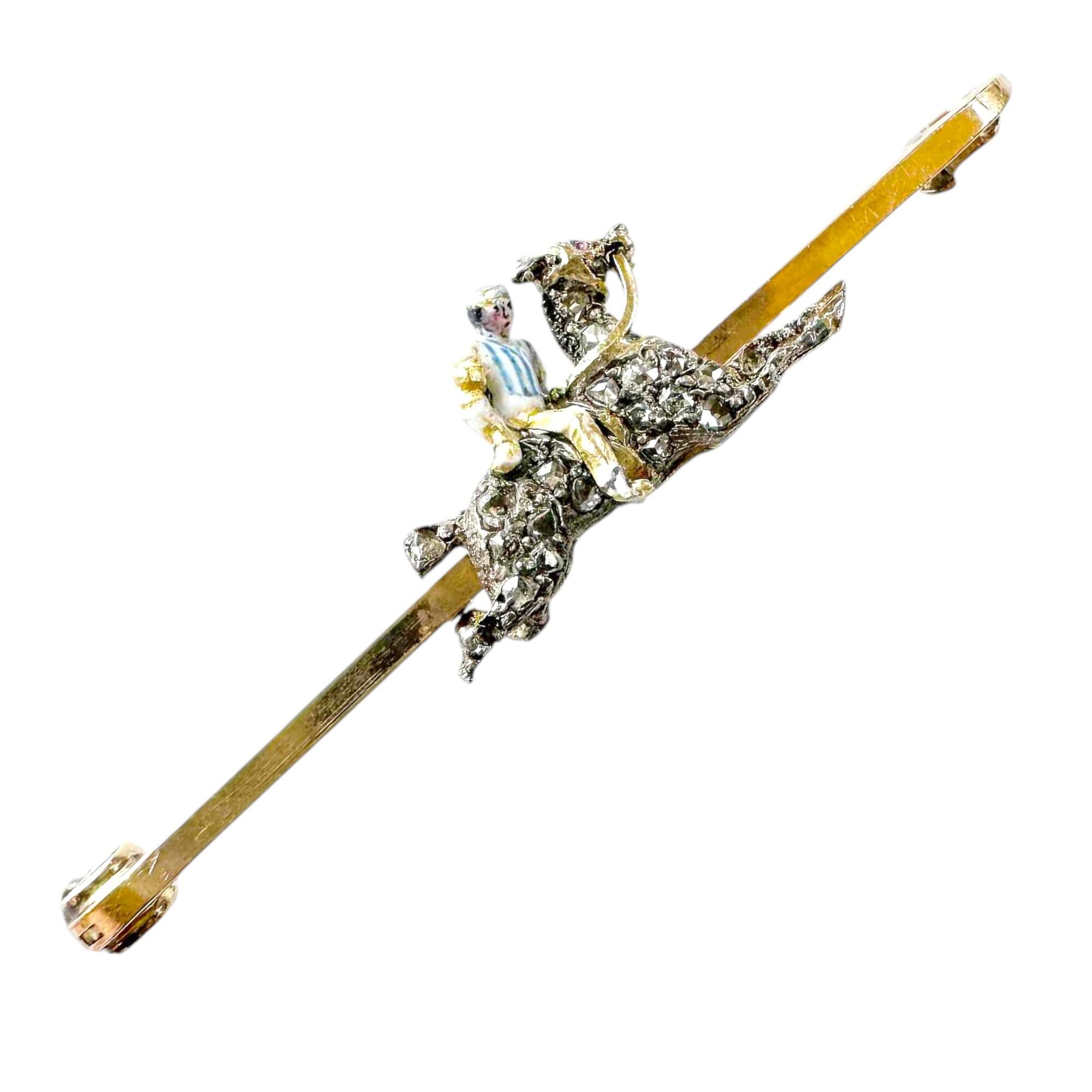 Antique Edwardian equestrian brooch with jockey on racehorse, silver with diamonds, gold accents, and ruby eye, 9ct gold hallmark.