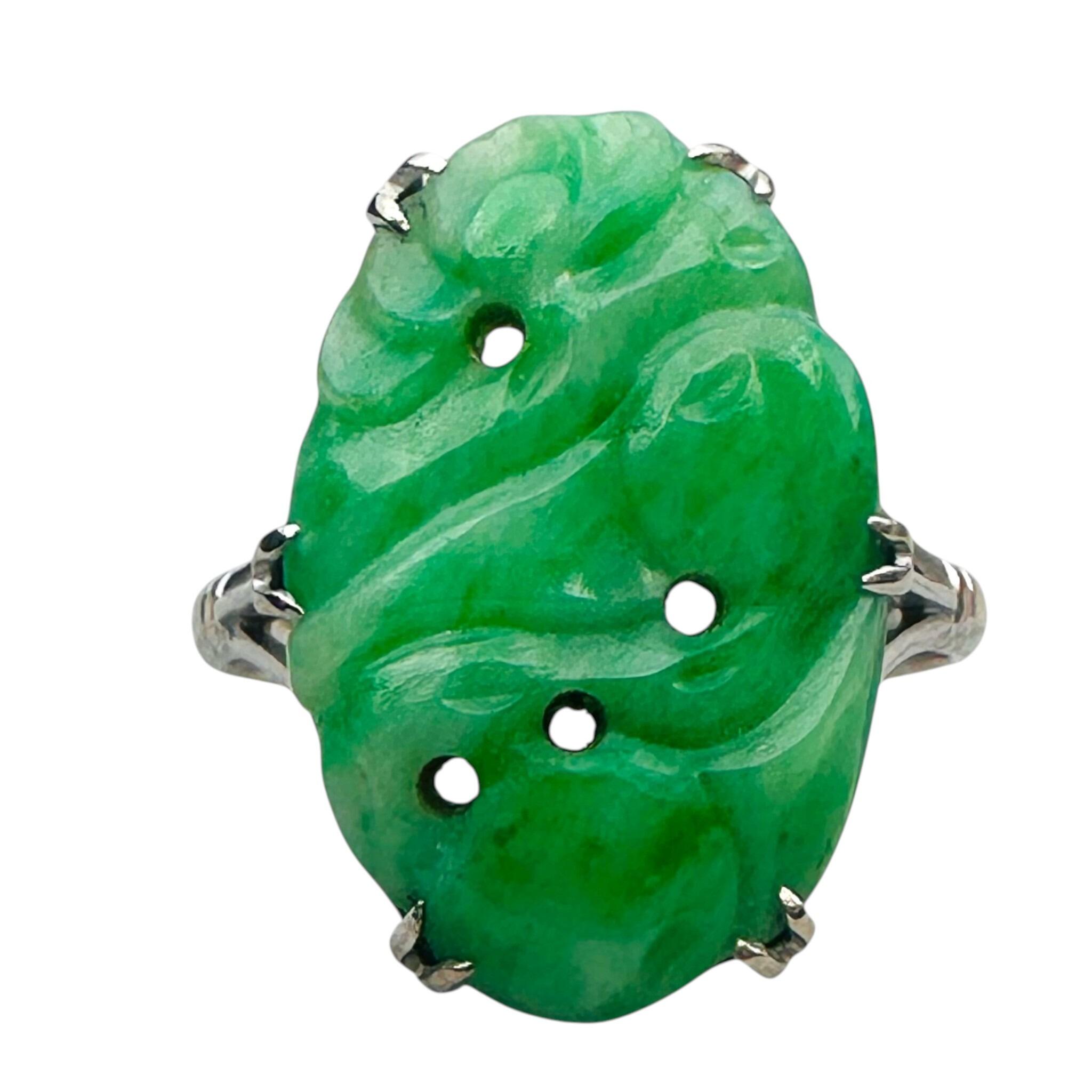 front view of White Gold & Carved Jadeite Ring with white background