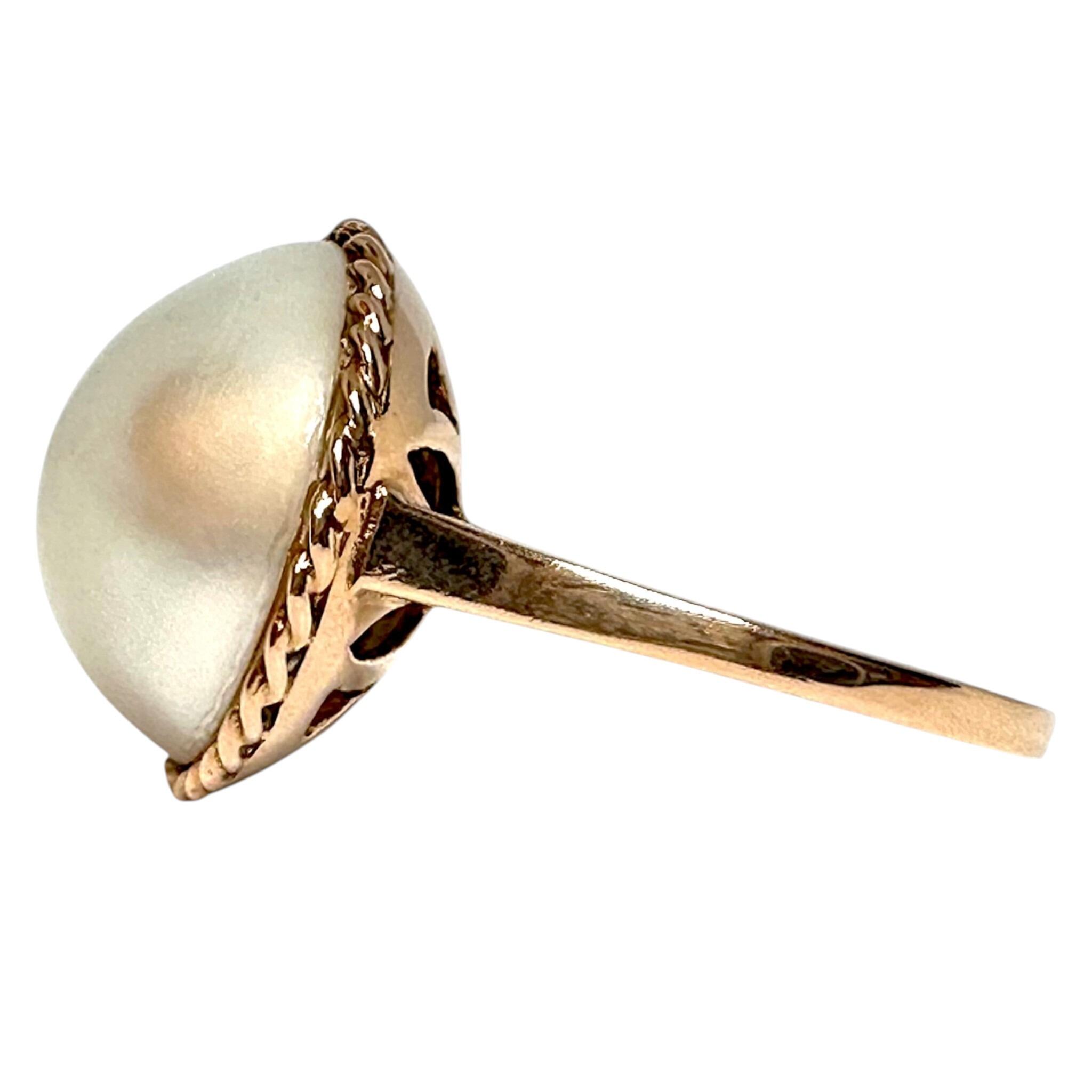 side view of Vintage 9k Gold Mabe Pearl Cocktail Ring white background