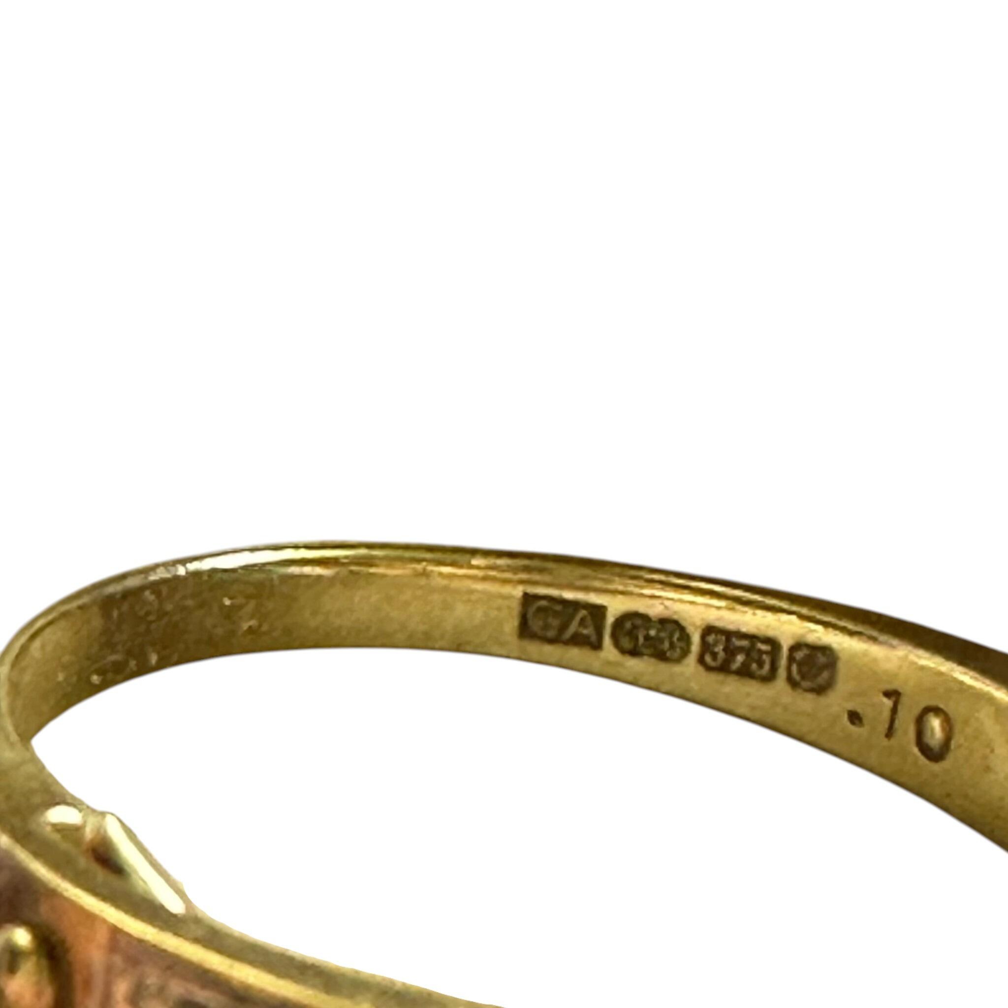 close up of Vintage Gold & Diamond Secret Message "I Love You" Ring with white background