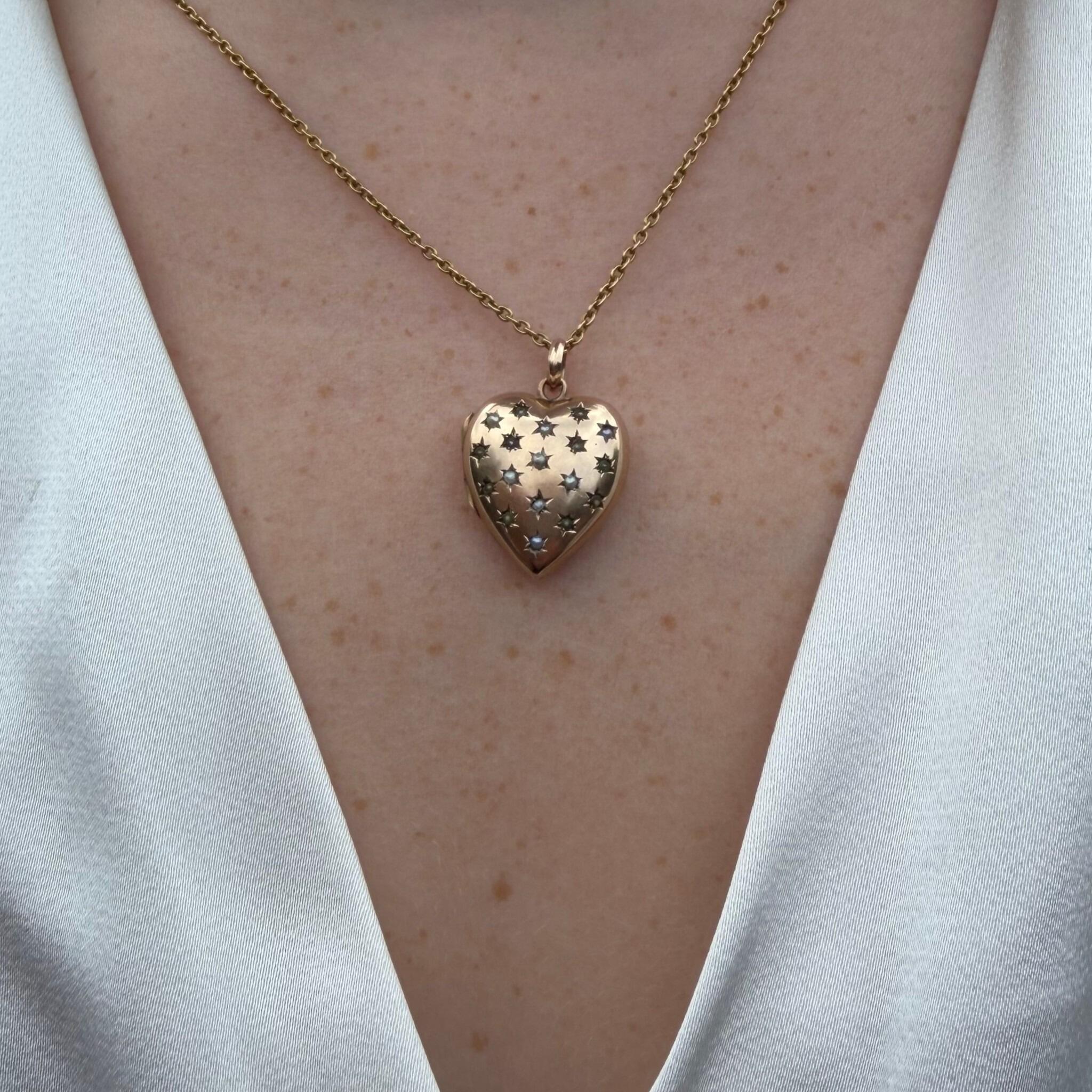 Vintage Gold Pearl Star Set Puffy Heart Locket worn on models neck wearing a cream blouse