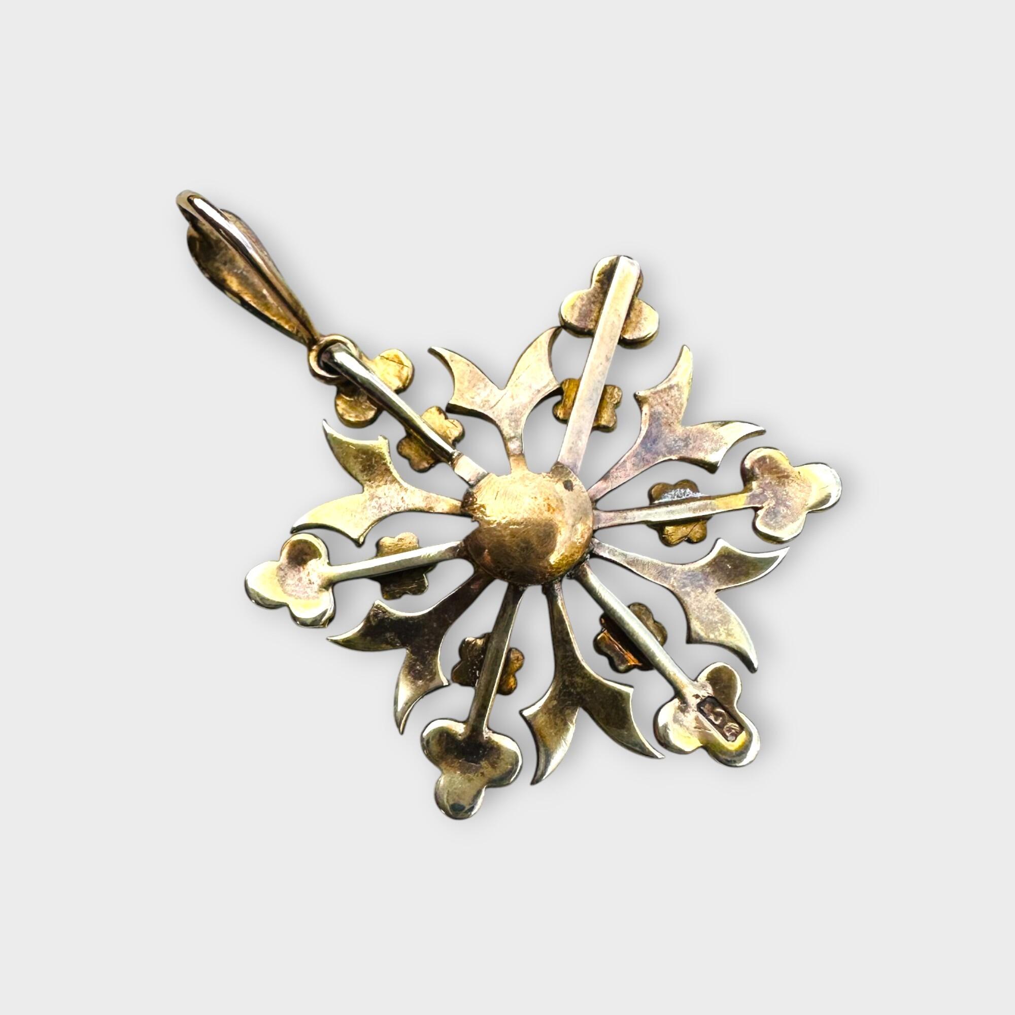 rear view, antique 9k gold Turquoise and pearl snowflake pendant on grey background