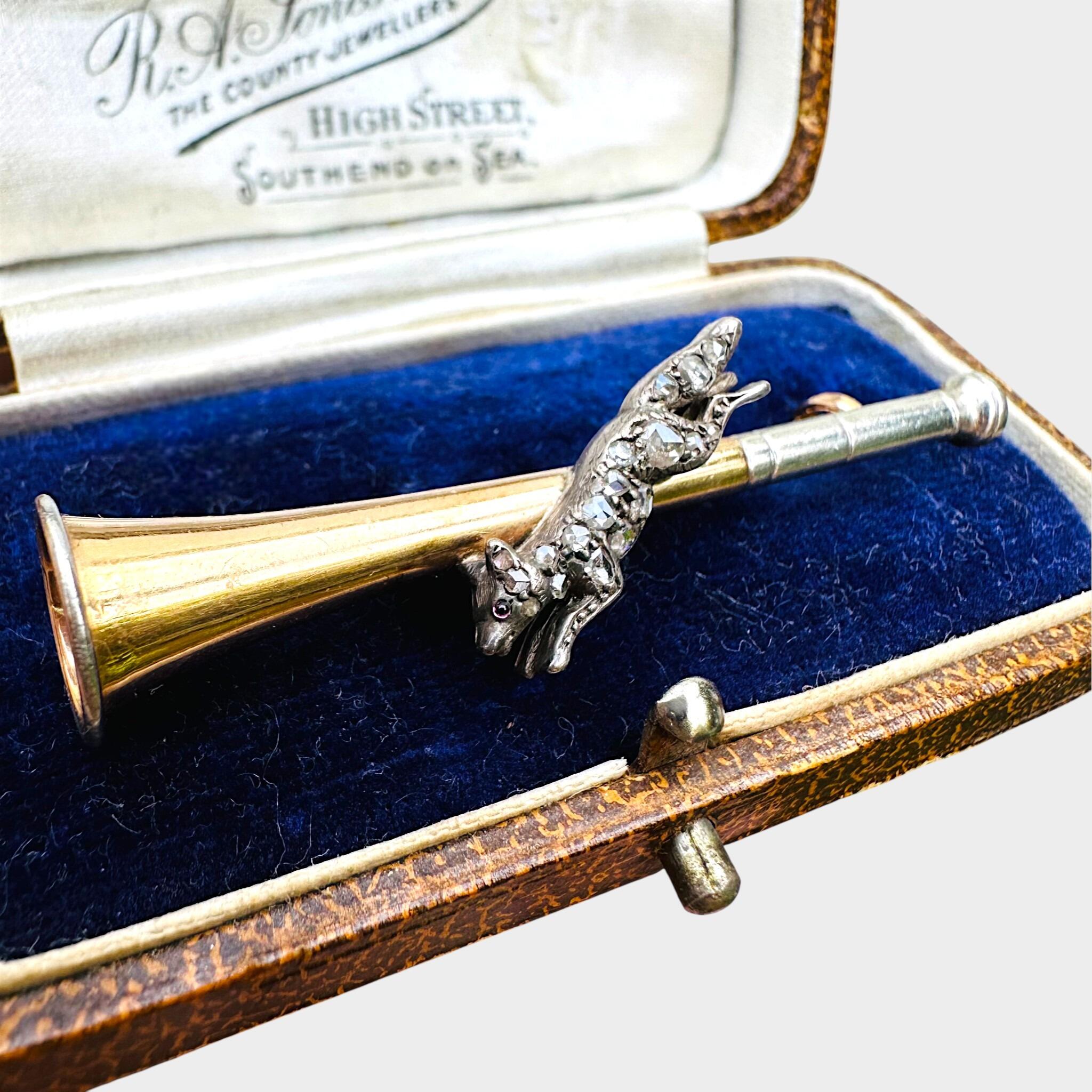 15ct Gold & Platinum, Diamond Running Fox on Bugle Brooch , displayed in antique box