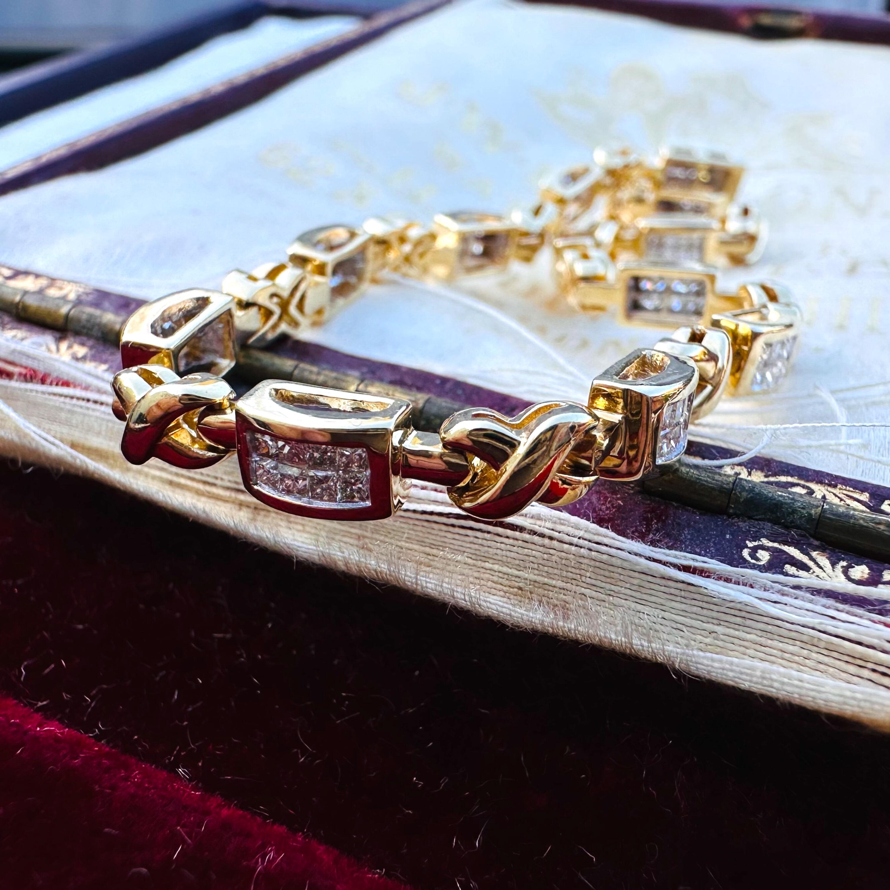14k Gold Princess Cut Diamond Tennis Bracelet displayed on antique box
