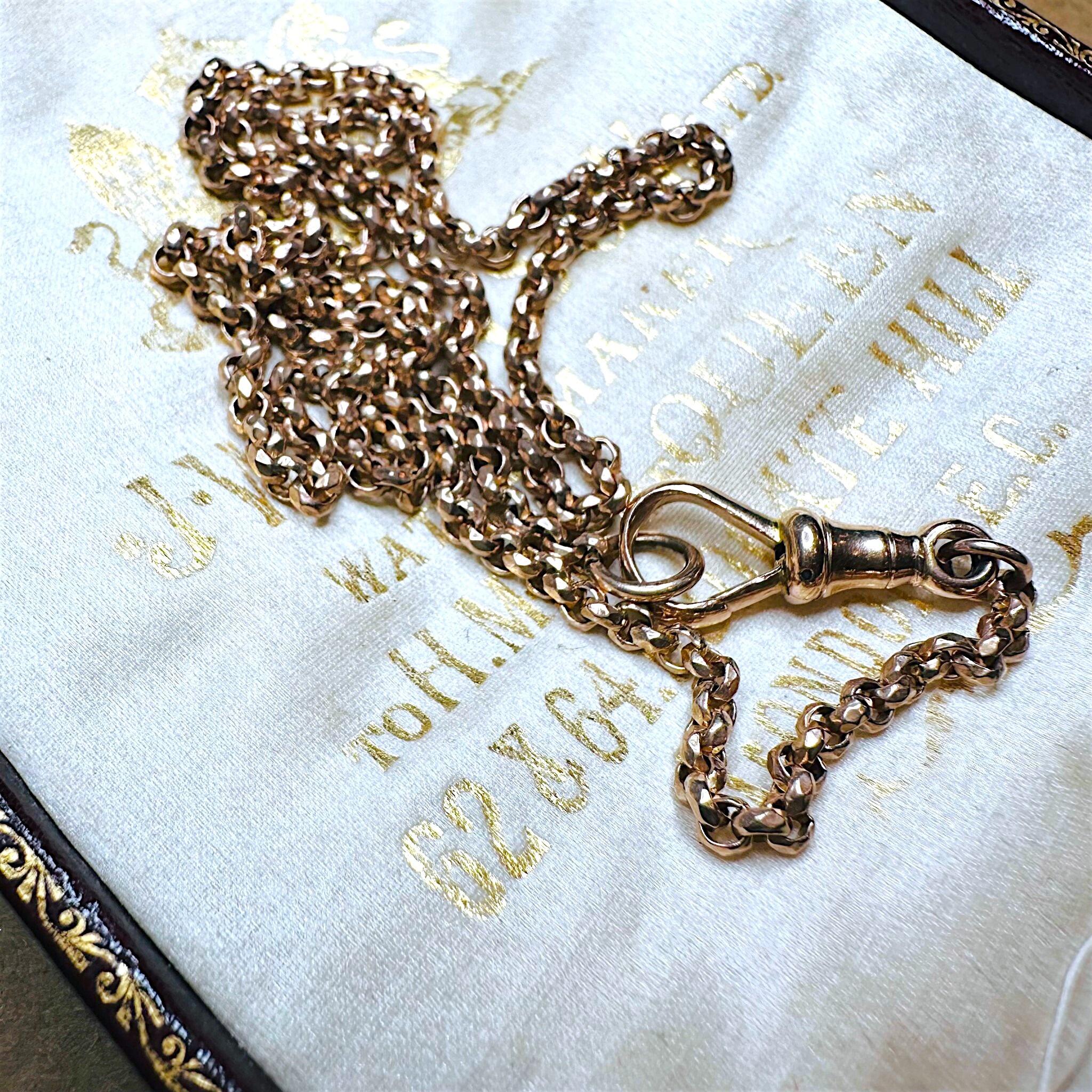 Rose Gold Belcher faceted Chain Necklace & Dog Clip displayed on antique box