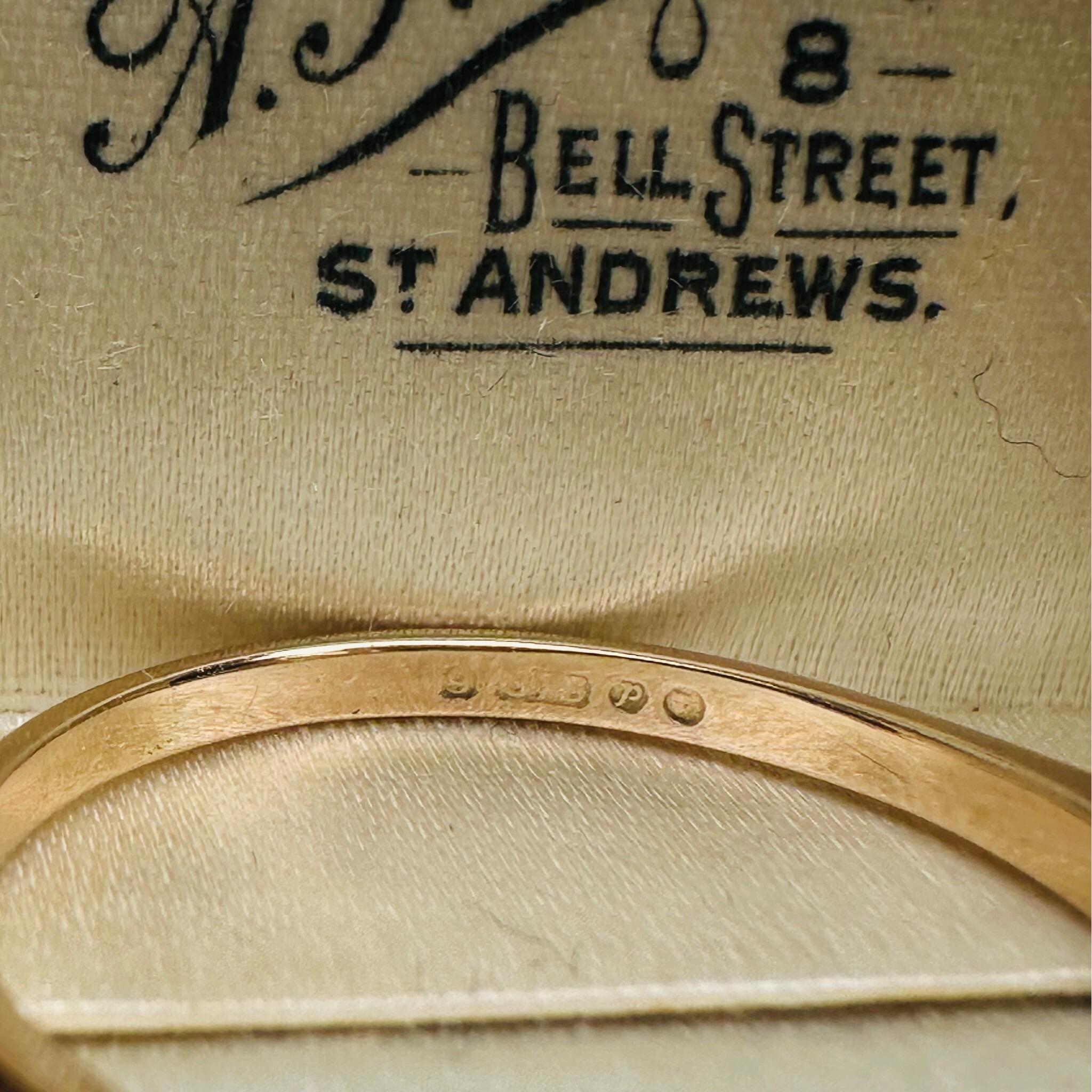 close up of Vintage 9k Gold Mabe Pearl Cocktail Ring laying on antique box