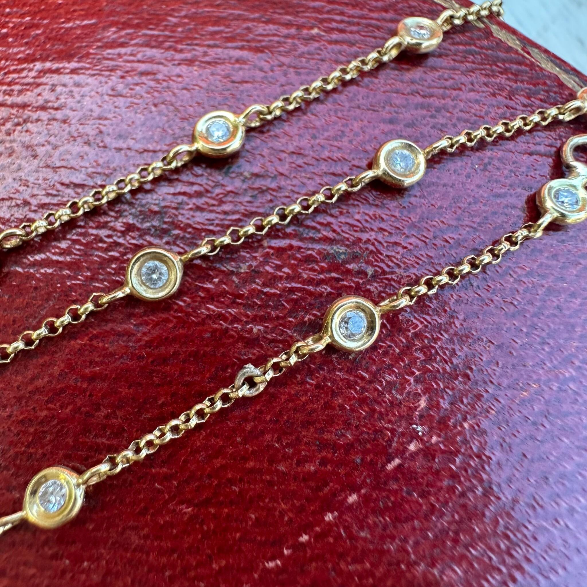 18K Gold Diamonds by the Yard Necklace Inspired by Tiffanys displayed on red antique box