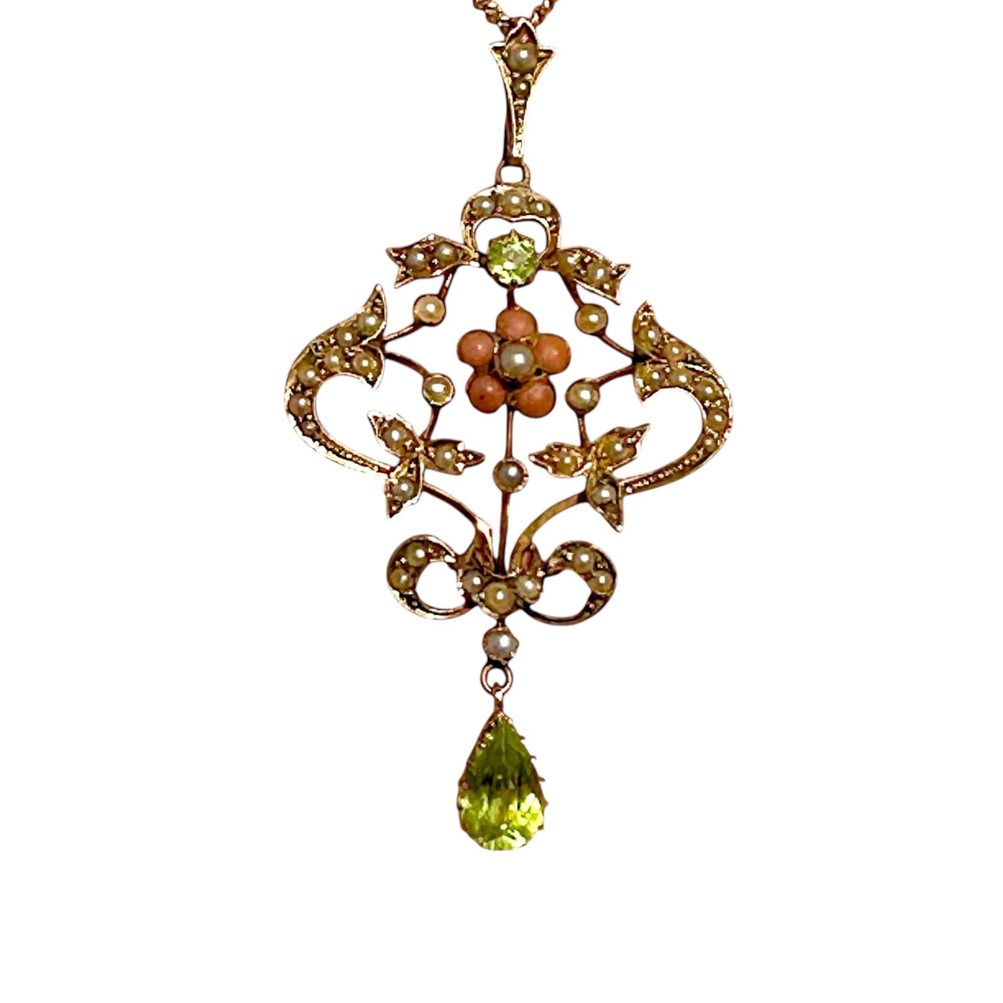 Art Nouveau 9k gold Lavaliere Pendant Peridot & Pearl Floral Motif, white background