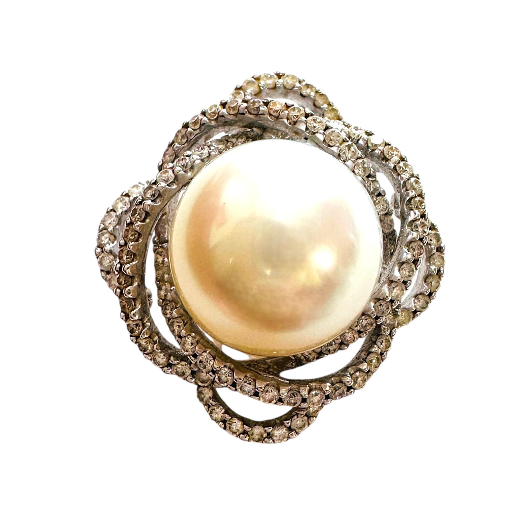 18k white gold southsea pearl pendant with abstract diamond flower frame on white background