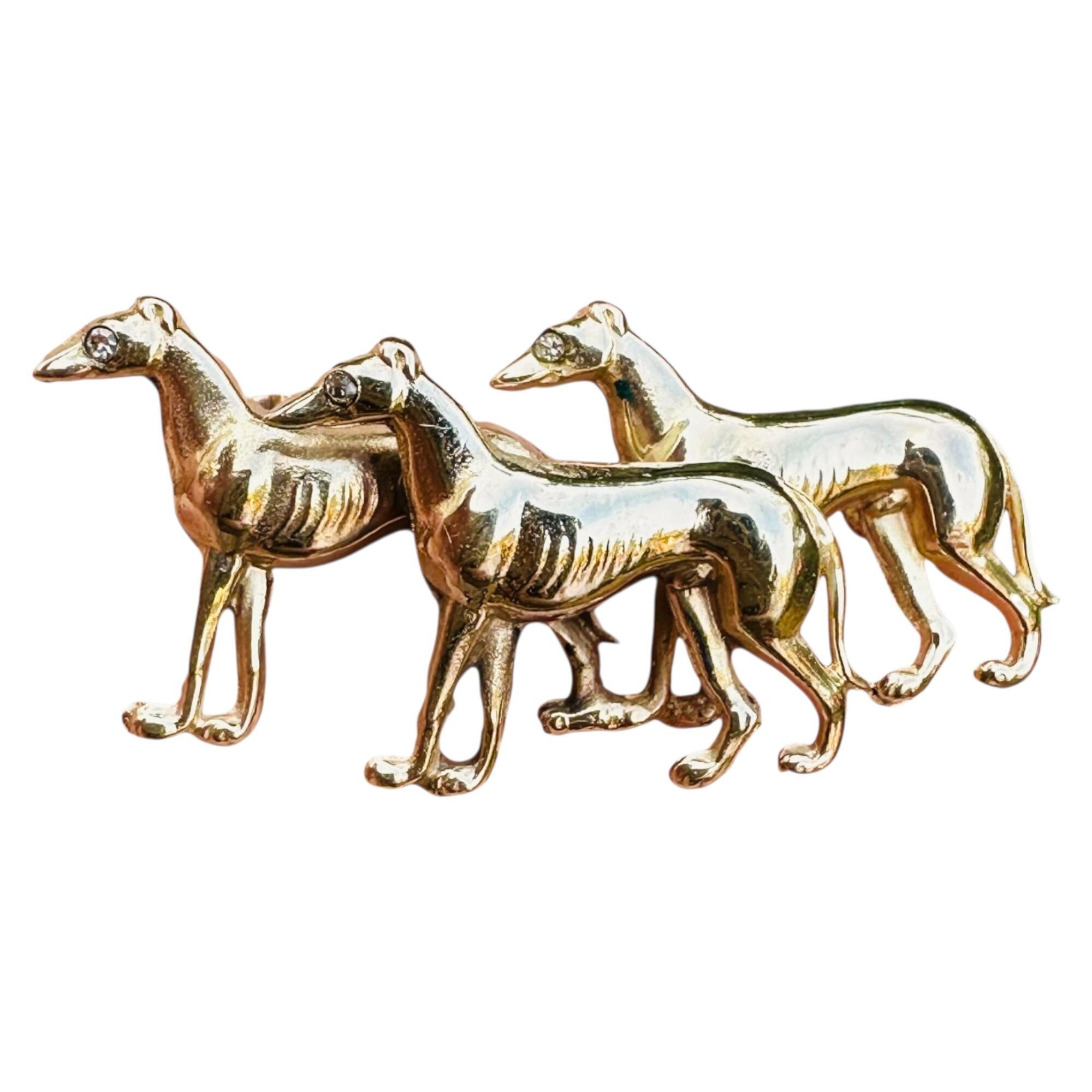 Rare, Antique 15k Gold Triple Greyhound Brooch with Diamond Eyes, white background.