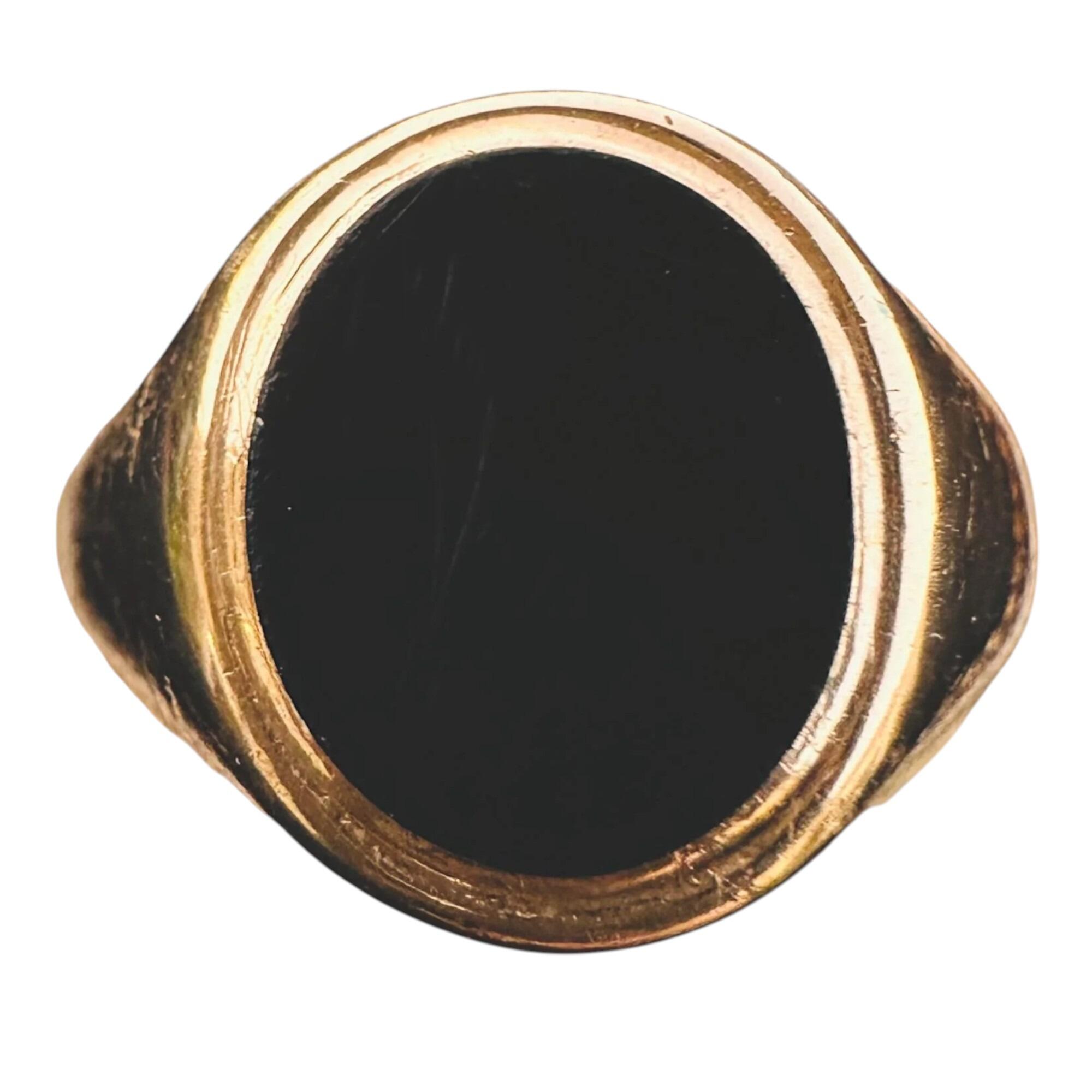 Vintage, 9ct, 9k, 375 Gold Black Onyx signet ring, dated 1965, white background.