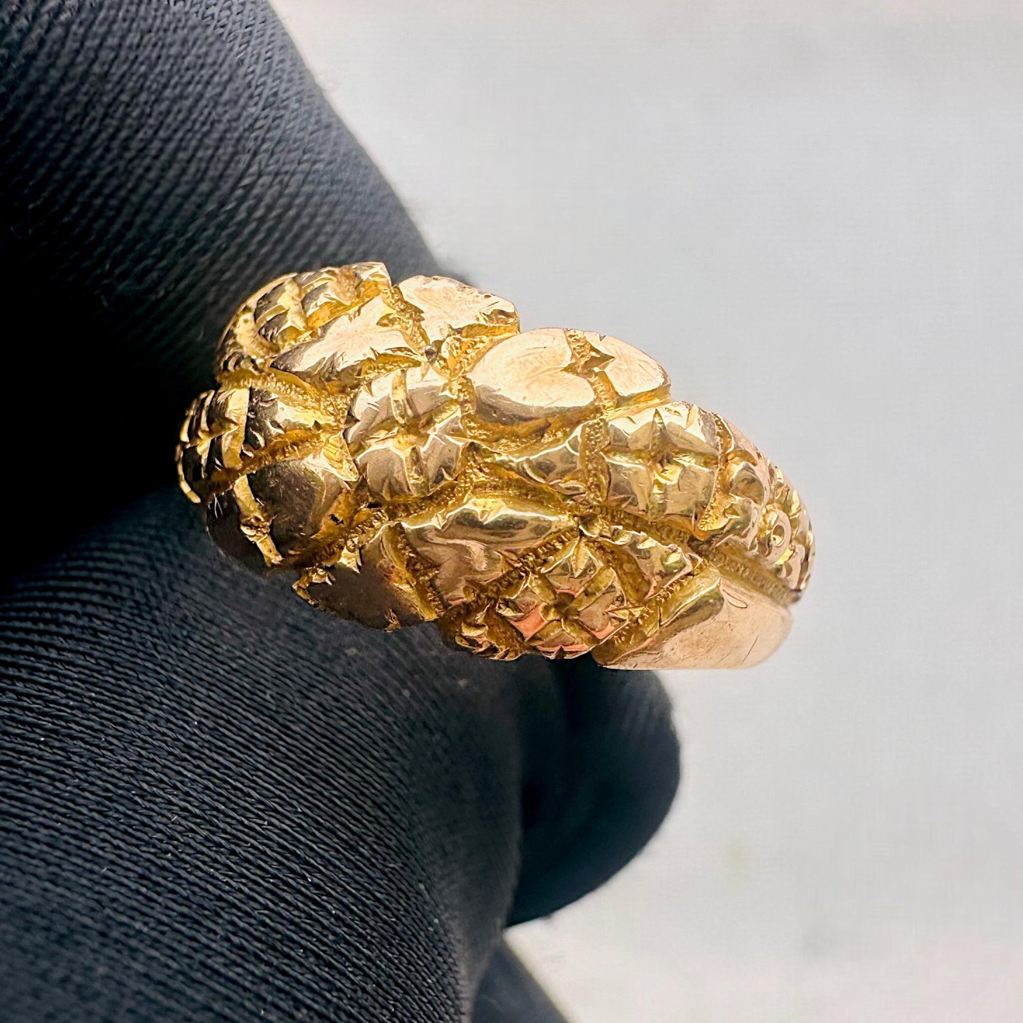Antique Art Nouveau Gold English Repoussé Ivy & Rose Dress Ring held in blacked glove with grey background