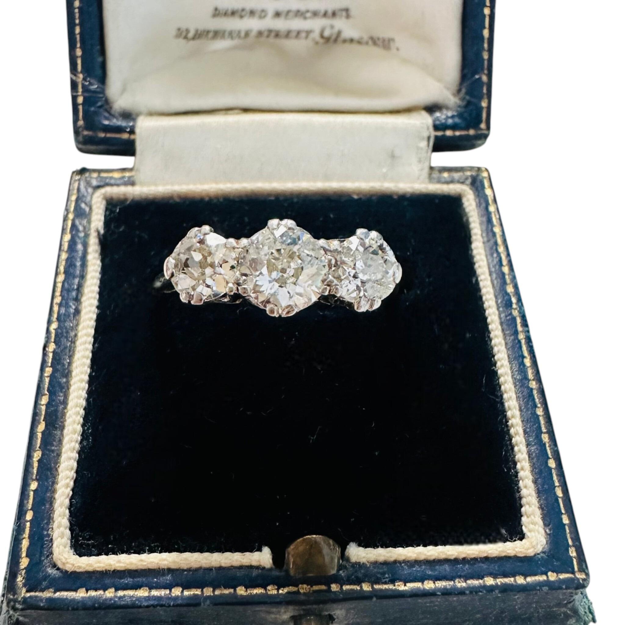 Antique Art Deco18K White Gold & Platinum, Old European Cut Diamond Trilogy Ring displayed in antique box