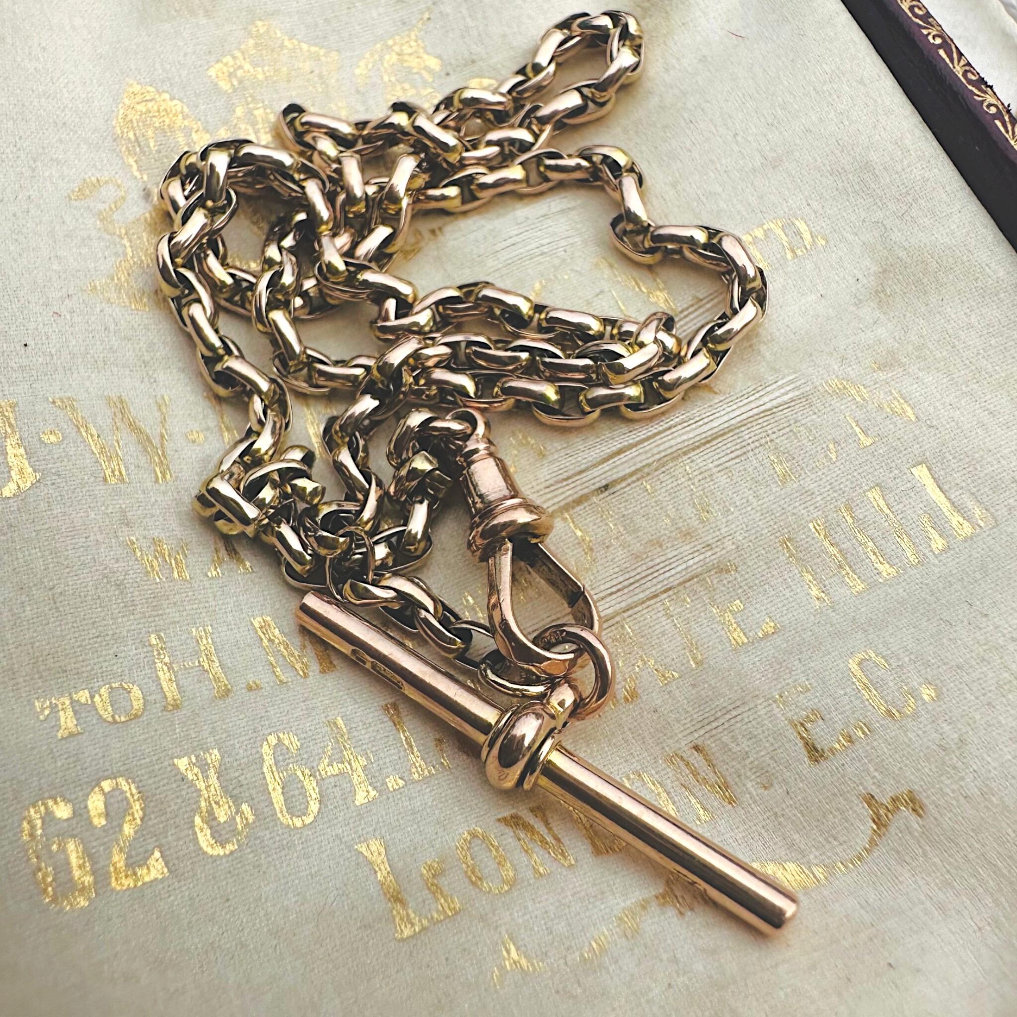 Antique Victorian 9k Gold Bike Link Chain & Dog Clip Clasp displayed on antique box