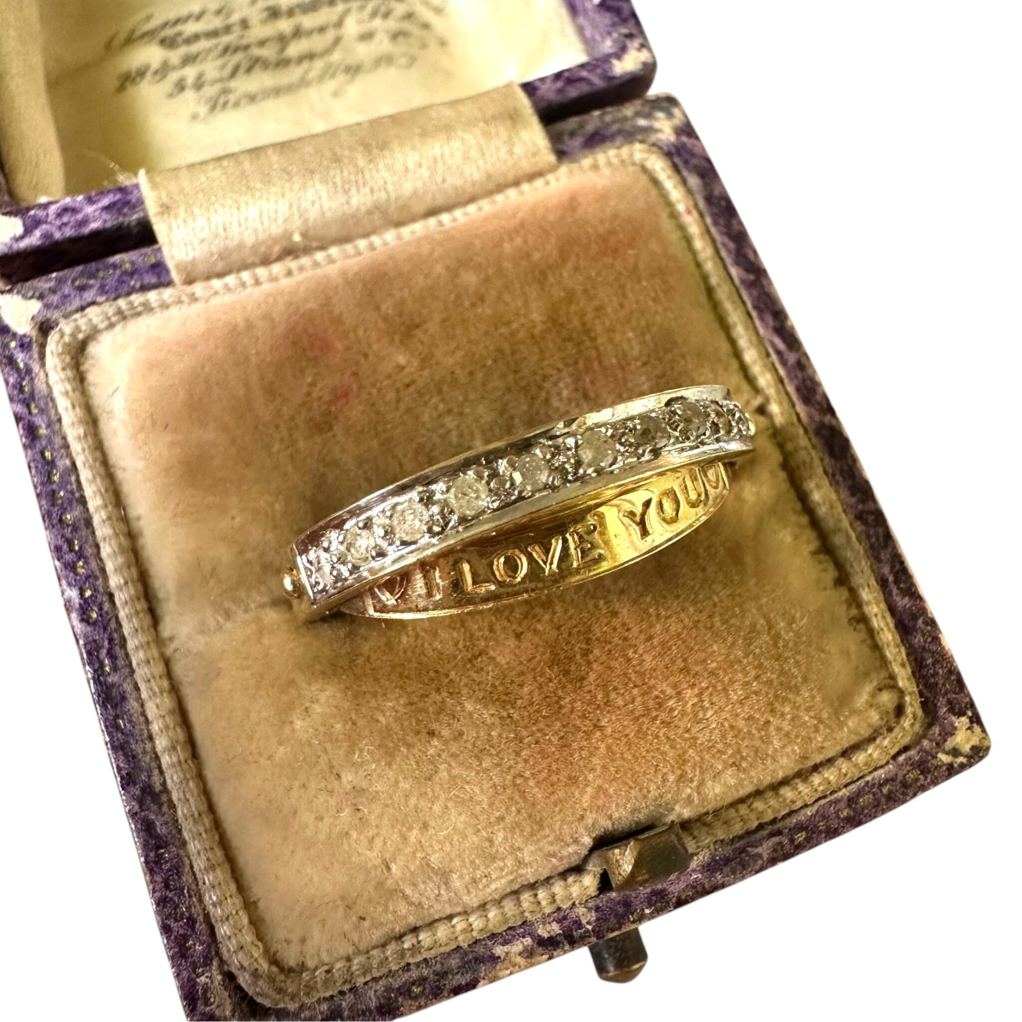 side view of Vintage Gold & Diamond Secret Message "I Love You" Ring displayed in antique box