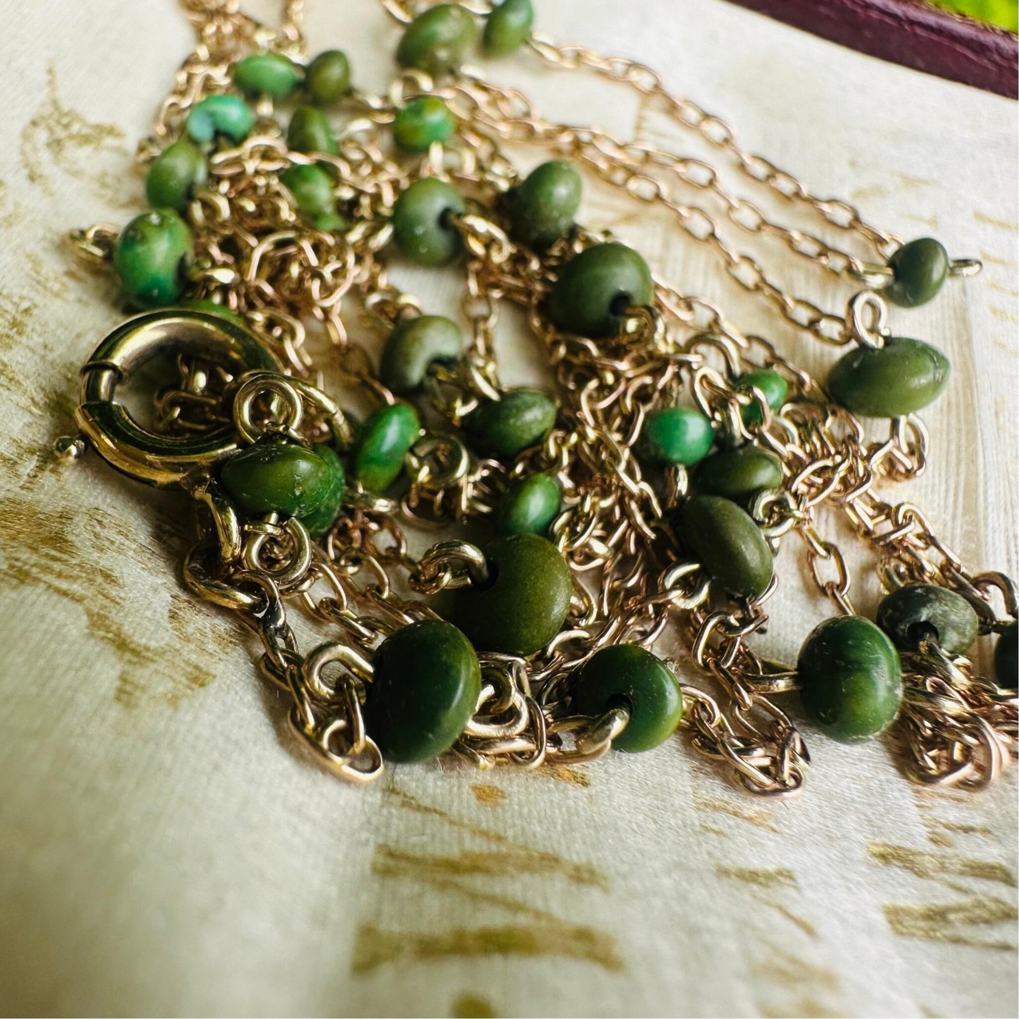 Antique Edwardian 9ct Rose Gold Turquoise Bead Guard Chain displayed on antique box