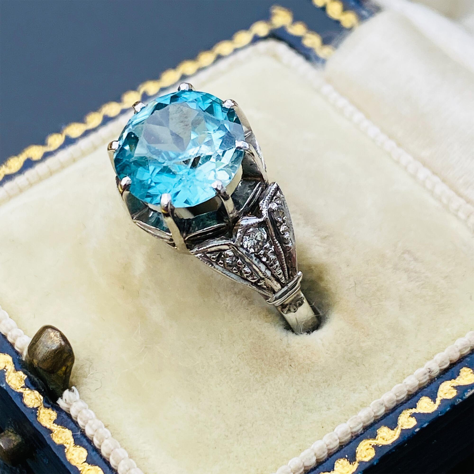 Exquisite Art Deco blue Zircon & Diamond ring with 2.75ct vivid aquamarine Zircon & diamond shoulders. Size N (US 6.75), 18ct gold, from 1920-1935.