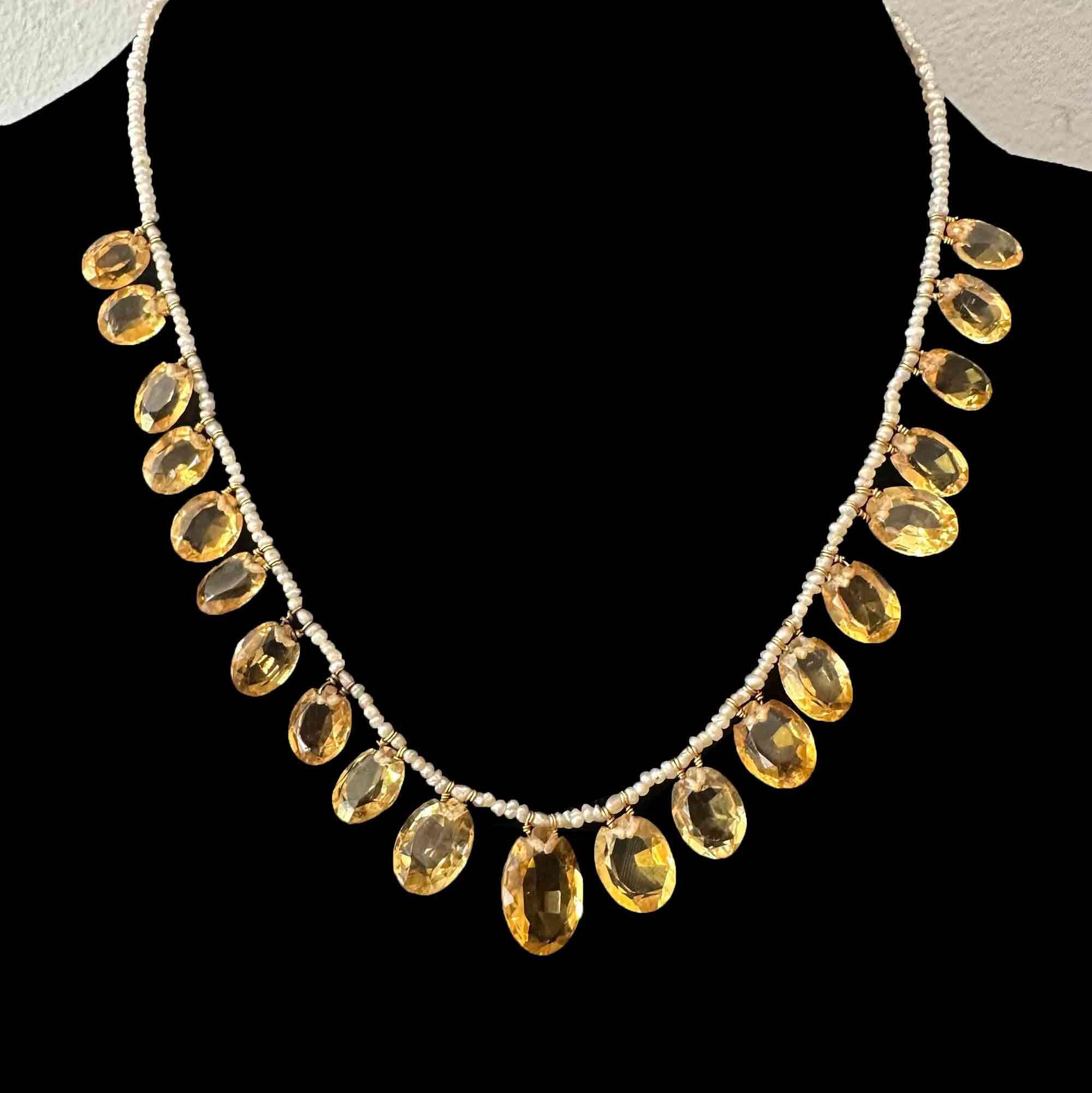 Full view of Edwardian citrine and pearl fringe necklace with 9ct gold chain, circa 1901