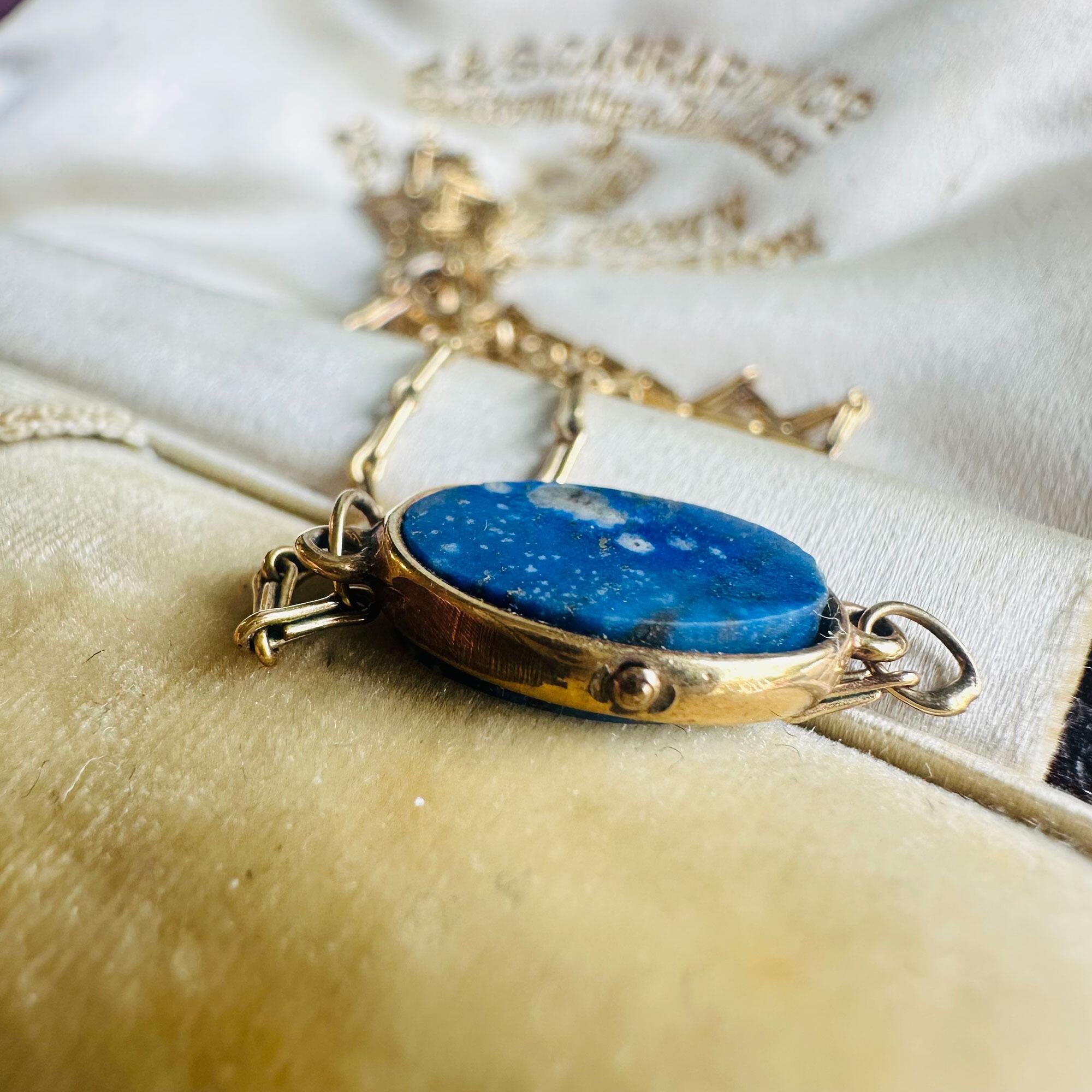 side view,Vintage 9ct gold lapis lazuli pendant necklace on antique box