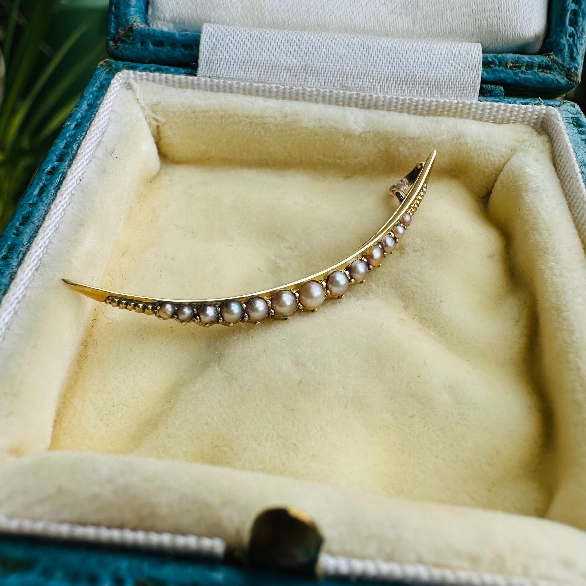 Antique 15ct gold crescent moon pendant set with seed pearls, Victorian era.