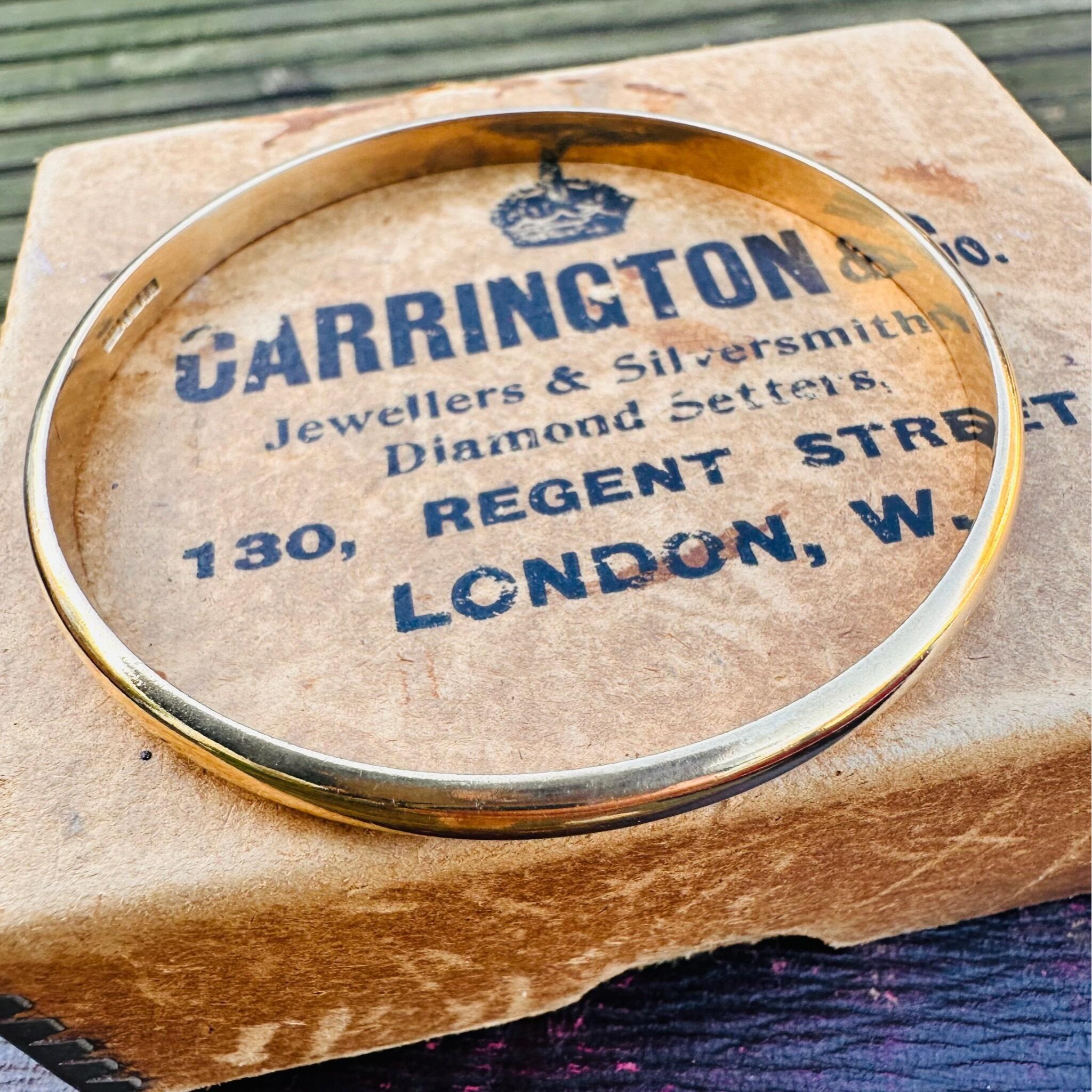 side view of 9ct Solid Gold D Shaped Bangle, Charles Green & Sons 1987 Hallmarked displayed on box
