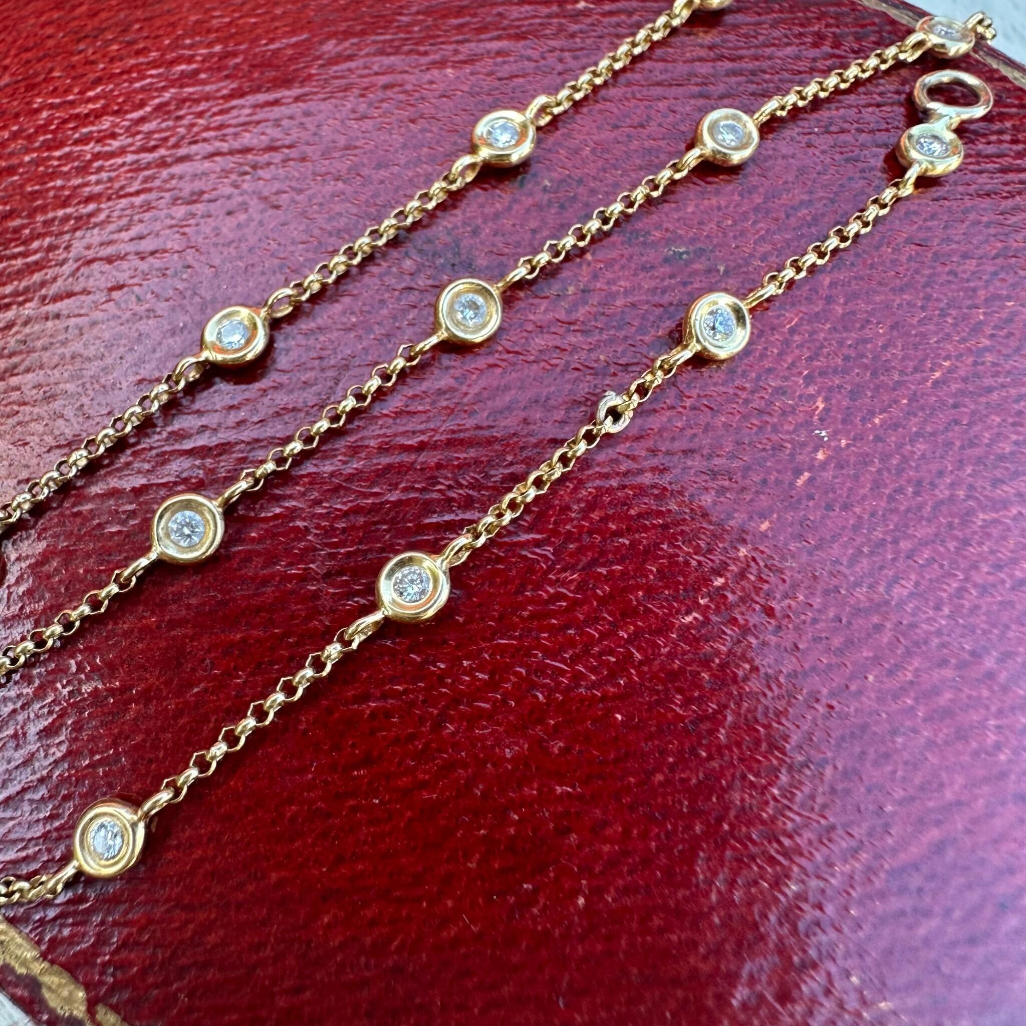 18K Gold Diamonds by the Yard Necklace Inspired by Tiffanys displayed on red antique box